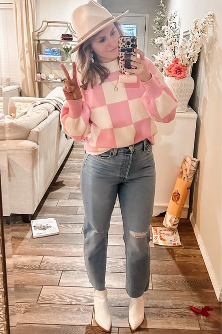 My valentines outfit! The cutest pink checkered Amazon sweater (so soft too) & my new fave pair of Levi jeans!!! High waisted, quality denim! fitted through hip & thigh— then straight leg! LOVE these jeans.

Spring sweater.  Amazon fashion. Date night outfit. Mock neck sweater. Amazon booties. White snake skin boots. Ankle boots. Spring outfits. 

#LTKunder50 #LTKSeasonal #LTKFind