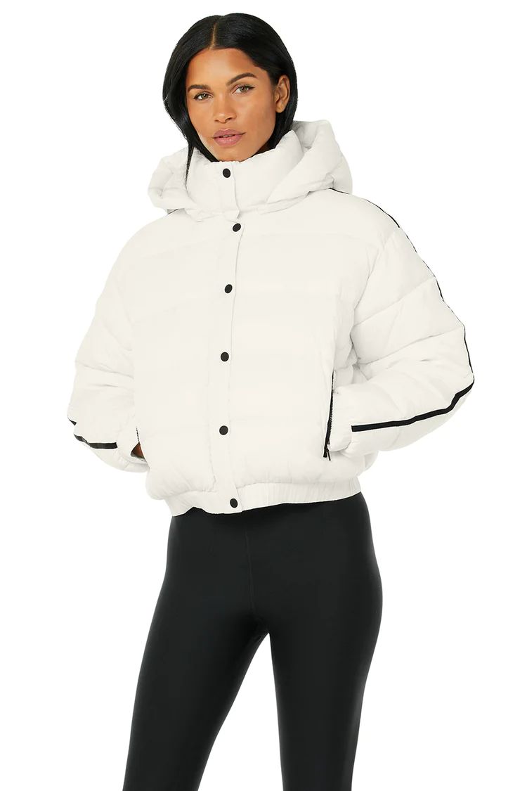 Regular length puffer jacket hits at the hip  
Slightly roomy fit for easy layering 
Model is 5... | Alo Yoga
