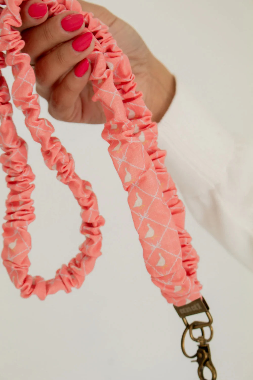 Coral Gaggle of Geese Lanyard | Shop Andi
