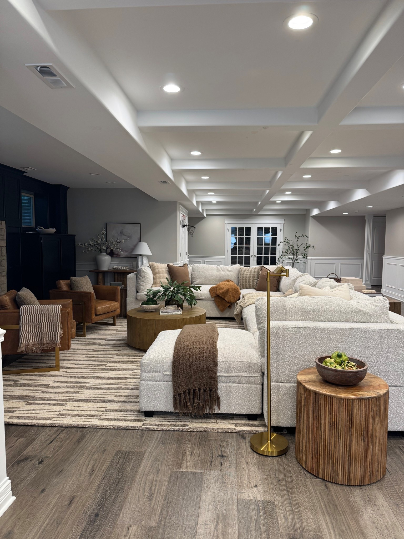 Basement living room inspo! I wanted to create a cozy, warm space for us and love how it turned out. This rug adds so much character and warmth here.

#wayfair #wayfairfinds #neutralrug #basement #livingroom #sofasectional #coffeetable #chair #ottoman #throw #fallhomedecor #fallhome #homedecor #sidetable #accentchair #modernhome
#modernorganic #transitional #affordablehome 

#LTKSaleAlert #LTKSeasonal #LTKHome