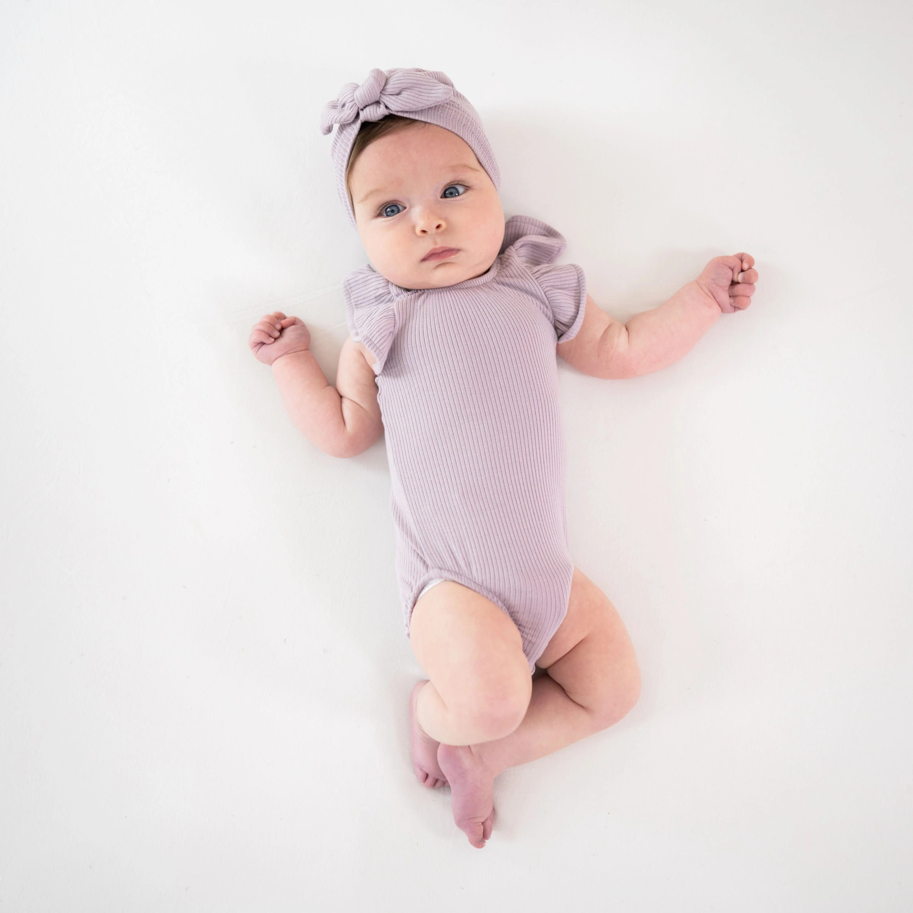 Ribbed Sleeveless Ruffle Leotard in Wisteria | Kyte BABY
