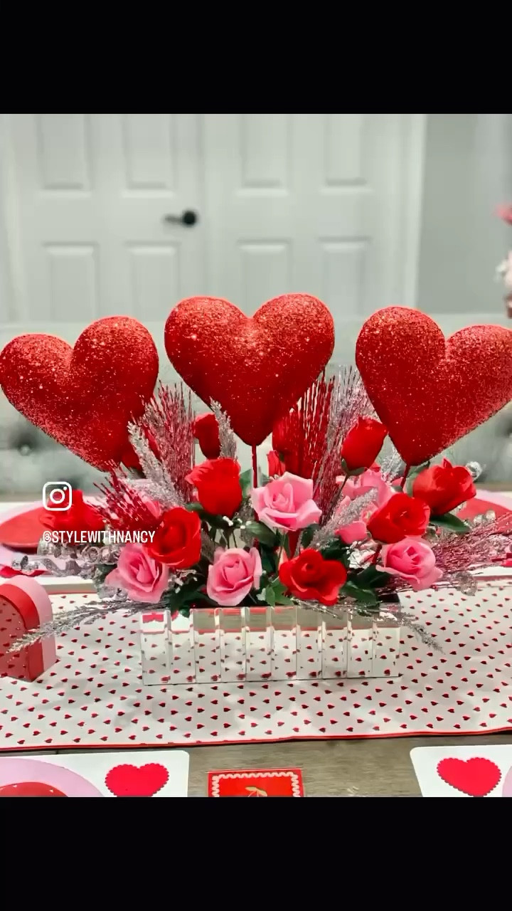 I reused my Christmas centerpiece vase that I got on @amazon for $28!  I invested in this vase because I will reuse it over and over for many holiday centerpieces 😉

I bought 3 styrofoam hearts from the @dollartree and painted them red & added glitter. I also got all the roses for $5.75 from the Dollar Tree.  I used the silver stuff/picks from the Christmas centerpiece after removing all the blue decor. 

Would you like to see the how to do it video? 

#diycenterpieces #diyvalentinecrafts #diyhomedecor #dollartreefinds #dollartreecenterpiece #decorateforless #shopforless #mirrorvase #valentinesdaydecor #valentinesdaycenterpiece #craftymomsoftiktok #craftwithme #howtomakecenterpieces #easycenterpiece #madein10minutes #stylewithnancy 

#LTKSeasonal #LTKParties #LTKHome