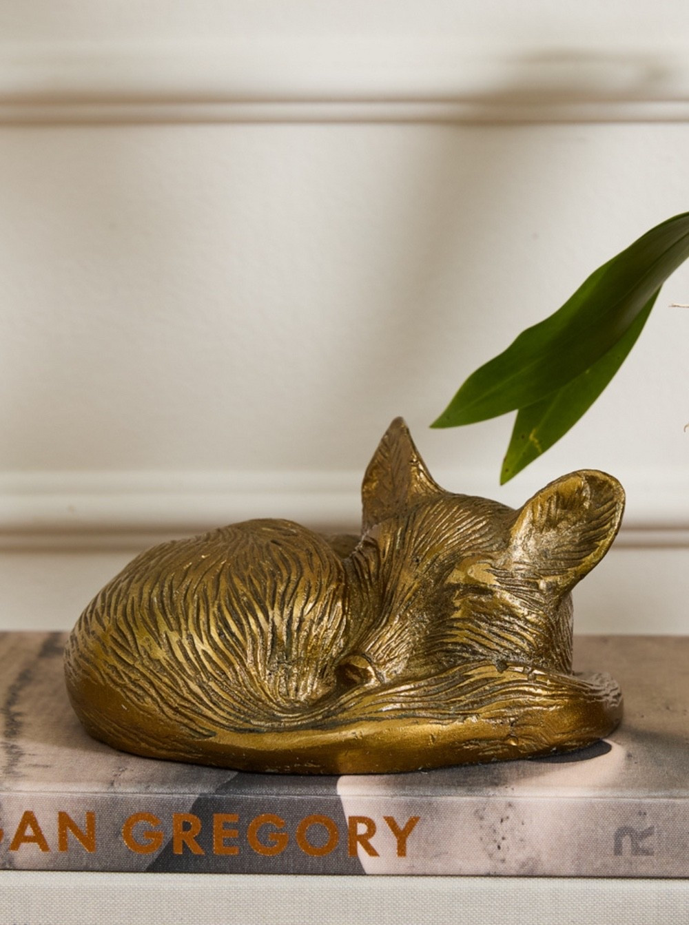 Add a touch of autumnal warmth to your decor with our Sleeping Fox Object. Cast in rich gold and bronze tones, this peaceful fox sculpture captures the quiet beauty of rest. Perfect as a tabletop accent or nestled among seasonal displays, it brings a subtle shimmer and woodland charm to your home all season long.

#LTKSeasonal #LTKHome
