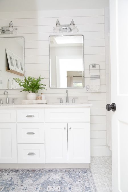 Shop our shared kids bathroom. We have a 60” double vanity with chrome mirrors and fixtures. The shiplap is painted chantilly lace  

#LTKhome #LTKFind #LTKfamily