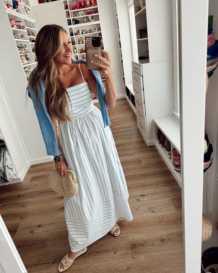 In a medium blue white stripe spaghetti strap maxi with back cut out, large blue cardigan, straw clutch, sandals and accessories- all fits TTS.

#LTKStyleTip #LTKFindsUnder50 #LTKSeasonal
