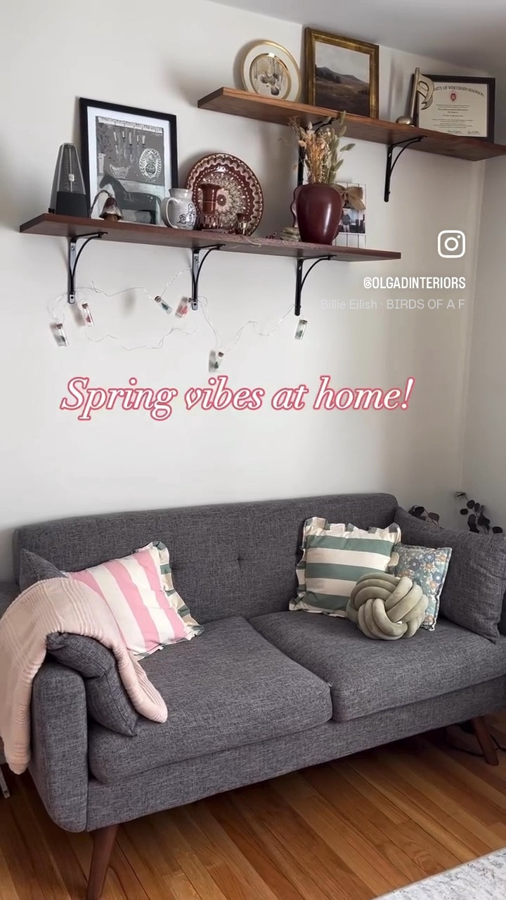 Loving my new striped throw pillows from Target! Have started decorating for Spring? Affordable sofa, living room furnuture, accent chair, Panton flowerpot lamp, bookshelf, styling, affordable rug. #homedecor #styling

#LTKStyleTip #LTKHome #LTKSeasonal