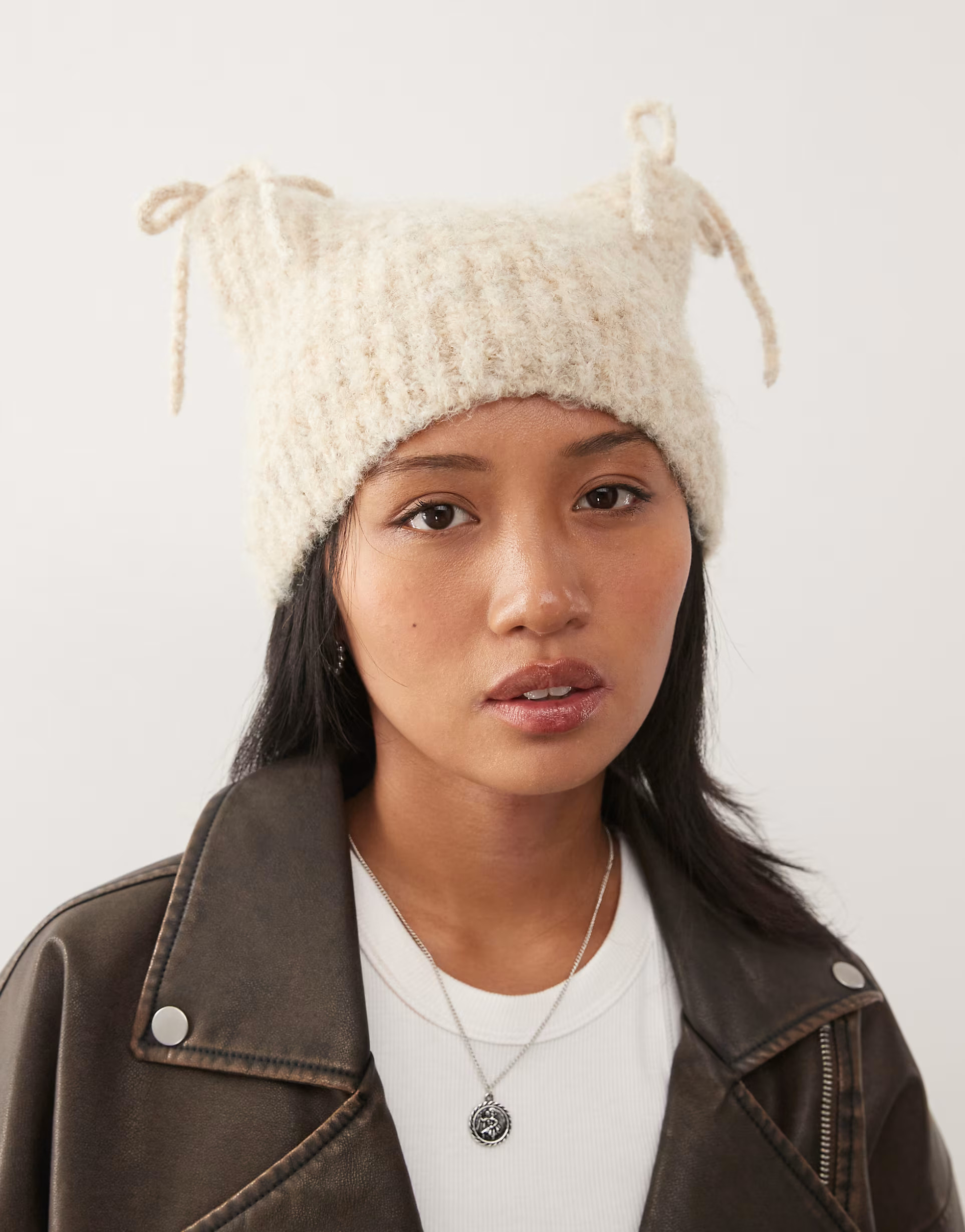 COLLUSION fluffy knit ear beanie with bow details in stone | ASOS | ASOS (Global)