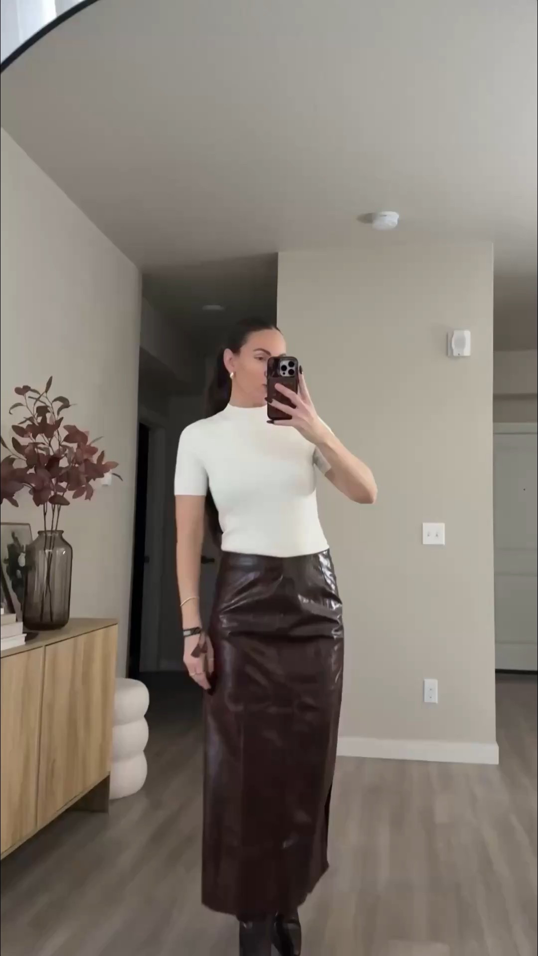 faux leather skirt.  topshop runway skirt almost sold out on asos. still in stock on nordstrom.  i'm 5'7 132 lb wearing skirt size 6.  top size small. and walmart blazer in large as i wanted it to be oversized.  boots are tts and designer inspired   #walmartfashion #notdstrom #topshop #outfit #casualchic 