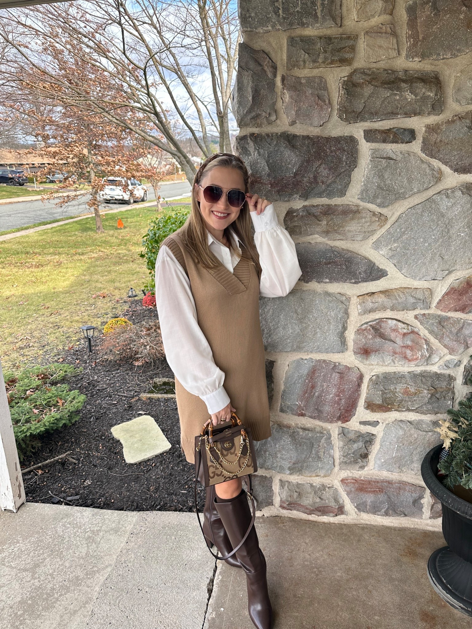 Thanksgiving layers done right 🤎 A sweater dress over a crisp button-down, chocolatey boots, and the dreamiest bamboo top handle. Shop the look on my LTK!

#LTKootd #LTKHoliday #LTKCyberWeek