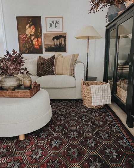 Vintage rug, plum rug, purple, orange, brown, ikat throw pillow, studio mcgee boucle ottoman, rustic vase, sitting room, family room, living room 

#LTKstyletip #LTKsalealert #LTKhome