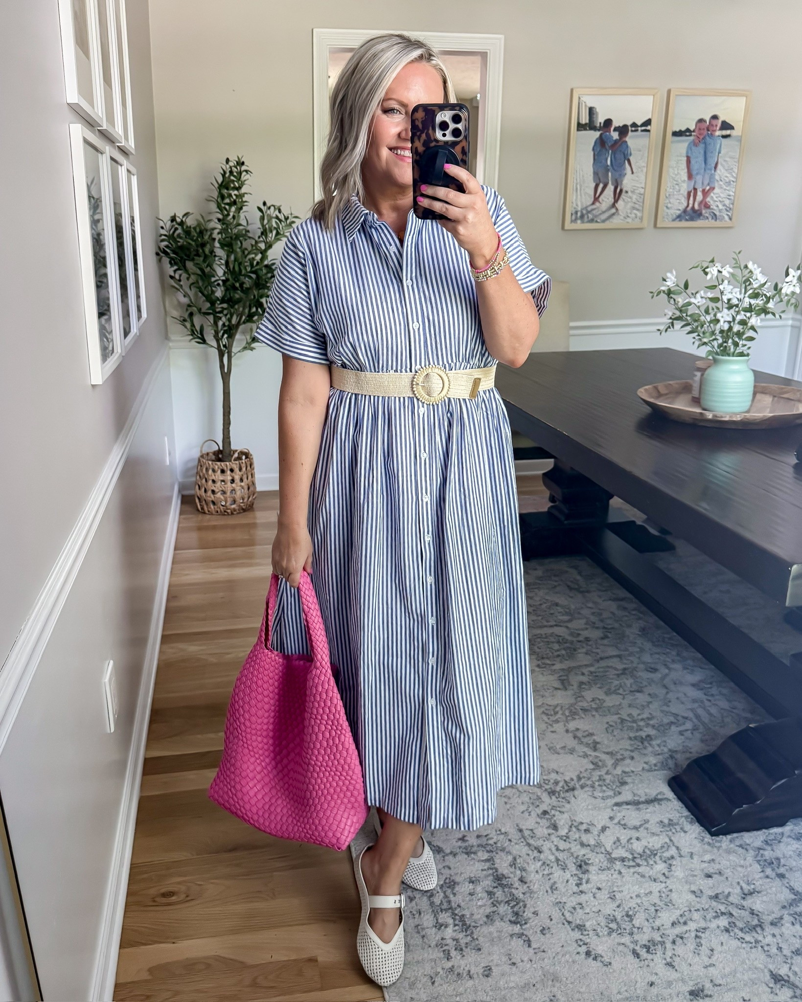 This striped midi dress is one of those effortless pieces you can throw on and instantly feel put together 💙 I love the classic blue and white stripes paired with the fun pink bag for a little pop of color. Perfect for brunch, church, vacations, or summer events.

striped midi dress, blue and white dress, summer dress outfit, vacation dress, classy casual outfit, brunch outfit idea, feminine midi dress, effortless summer style, resort wear outfit, church dress idea, woven pink bag, classic summer fashion, lovelylifestyling

#LTKootd #LTKSeasonal #LTKOver40