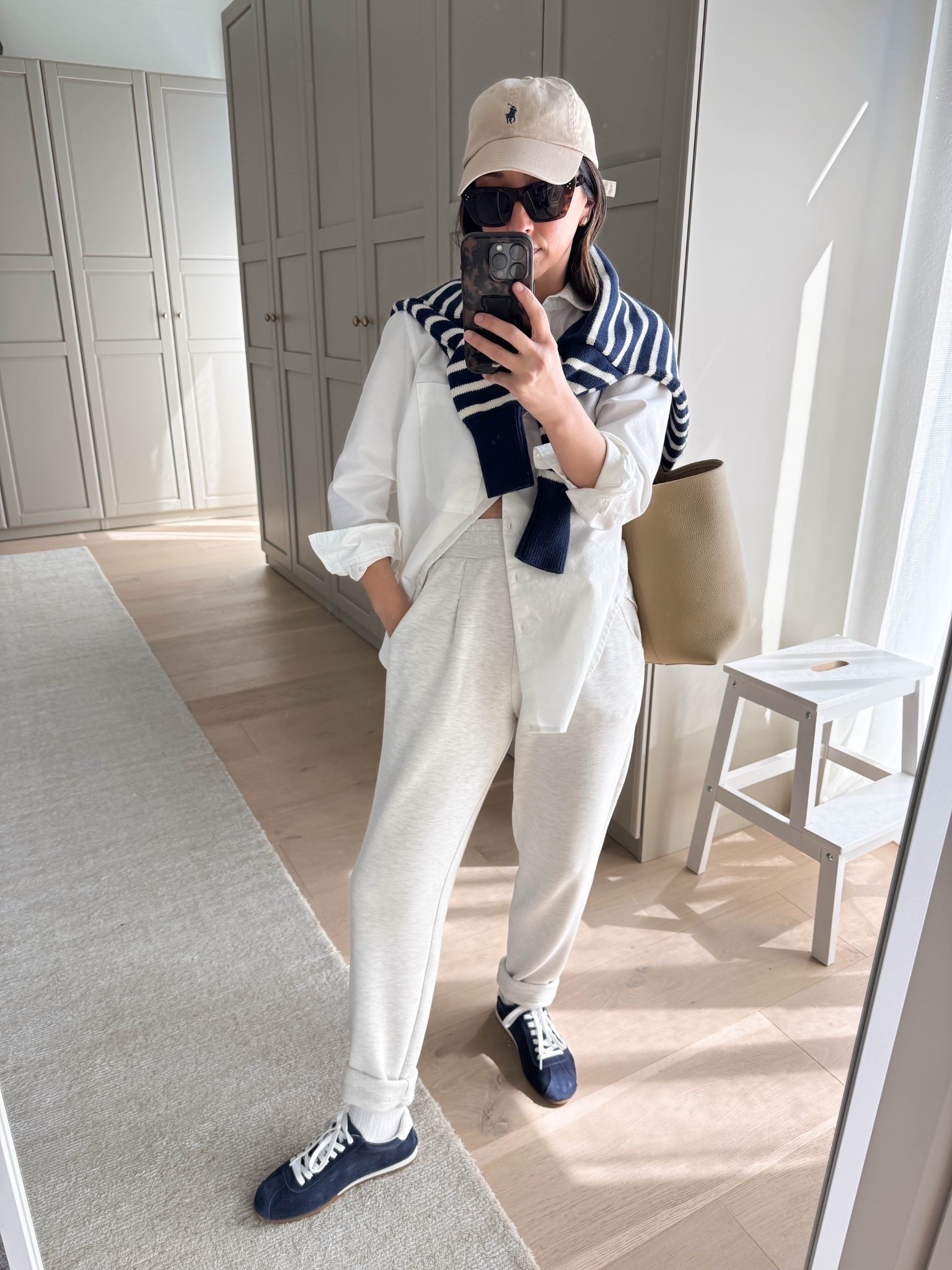 The best white button down of all time 🙌👏🏼

AYR Deep end xs
Varley pants xs 26” inseam 
Dolce Vita Sneakers 6 - run small
Minnow stripe sweater small - runs small
Celine sunglasses 
Polo Ralph Lauren hat
Dorsey James necklace 15”
Quince earrings

#LTKPetite #LTKmomlife #LTKootd