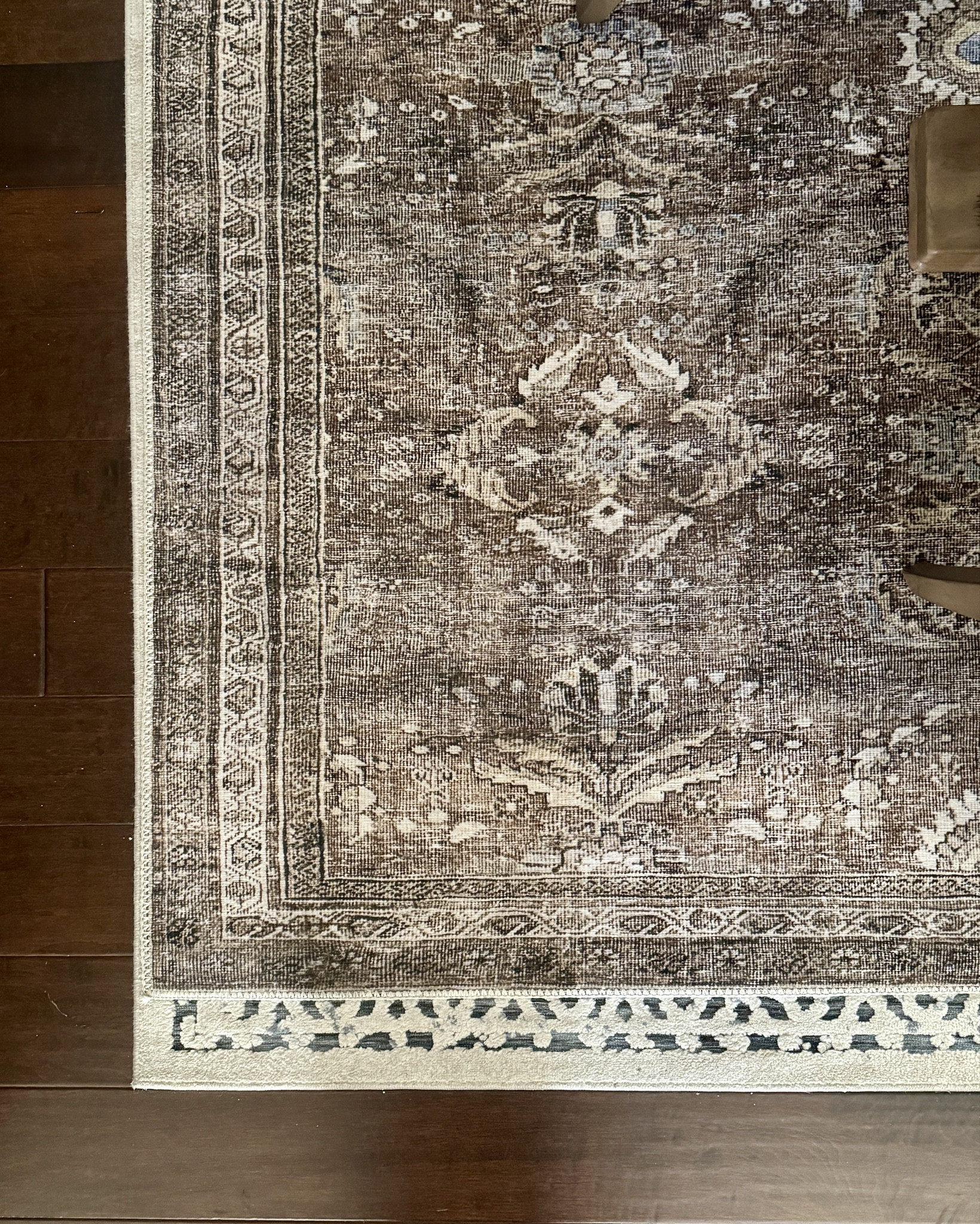 So nice I bought it twice! My lovely dining room rug, has swirls of deep chocolates, mocha, ivory, touches of black, soft light blue … beautiful neutral rug. I also bought this rug, in a smaller size, for in front of my sliding glass door. 

NOTE: i laid down this rug over the rug I formerly had in the dining room, so the edge of that one is peeking out a bit. Call it laziness, or just my sheer lack of storage… but it adds a nice layer of padding actually 😄

Neutral rug, deep neutrals, moody neutrals, rug, dining room rug 

#LTKHome