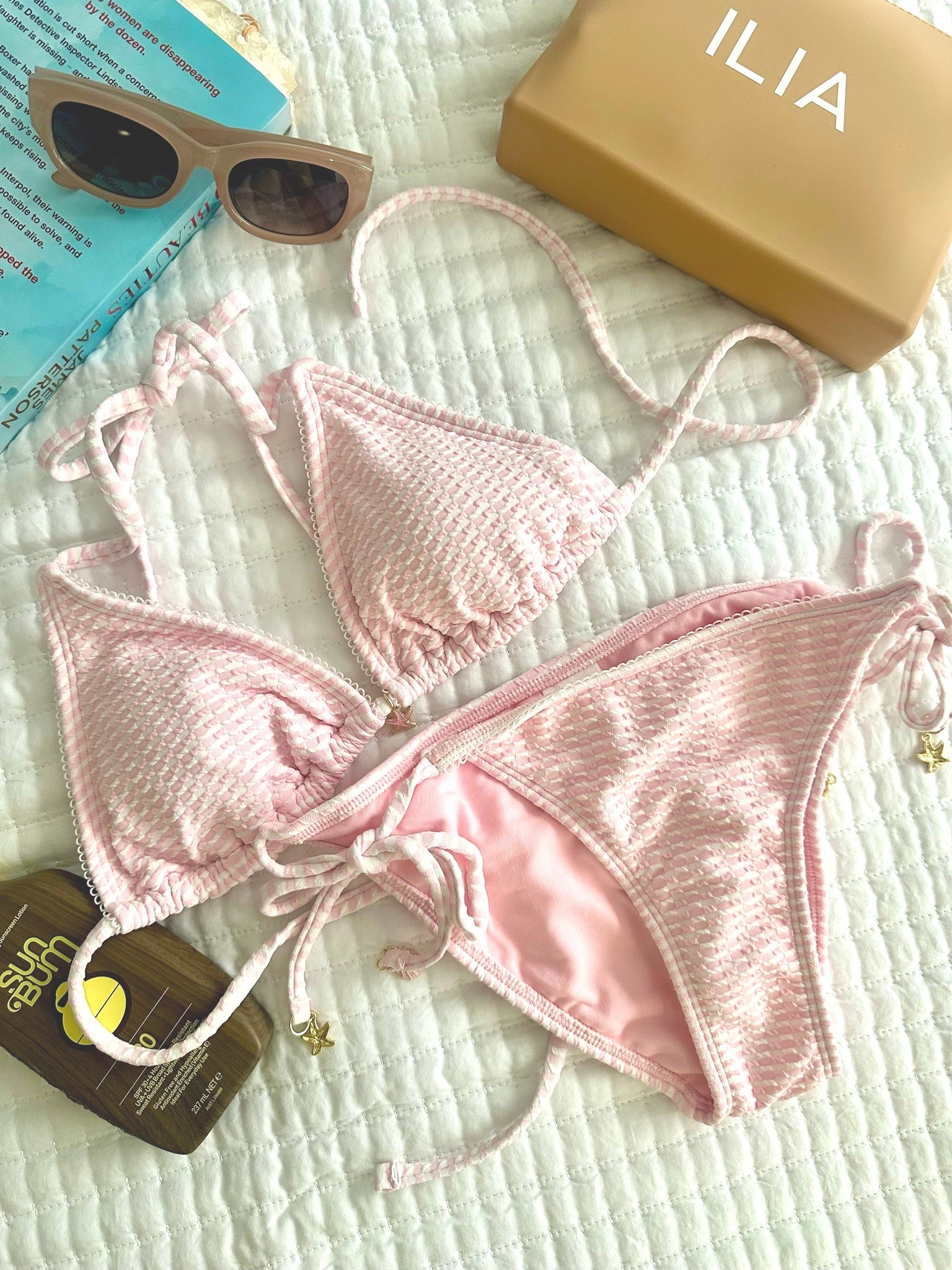 Cutest bikini set 
Textured stripe pattern baby pink and white triangle bikini top and matching string bikini bottom

#LTKSwim #LTKOver40 #LTKTravel