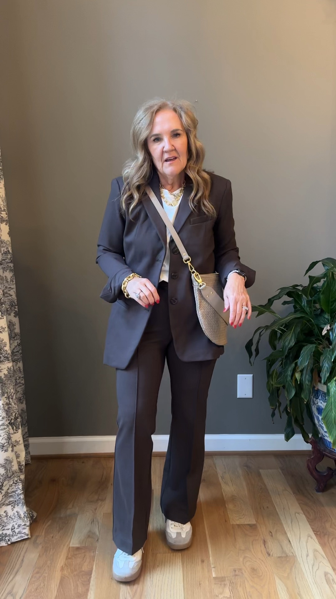 Loft versa. I’d recommend a petite if you’re 5’4 or under. Maybe even 5’5” 
I’m wearing a 10 petite. 

I traveled at the end of a conference in this suit. I was exhausted. But felt put together. This look is the professional look. Change in to sneakers, push the sleeves up and it’s casual. 

Super comfortable ponte knit. 

Office outfit professional suit brown suit 

#LTKWorkwear #LTKFindsUnder100 #LTKOver40