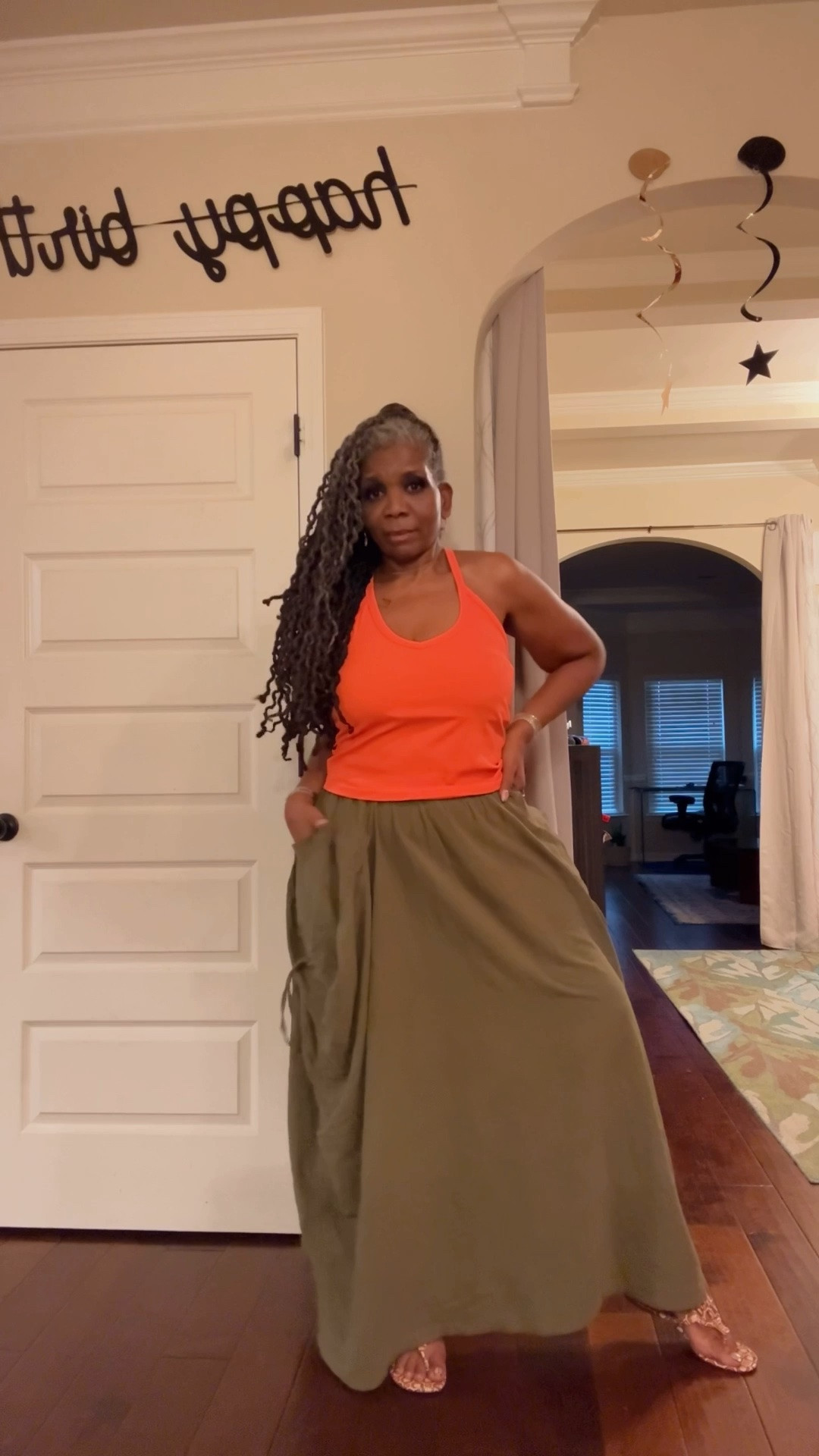 This is my go-to outfit this spring-summer.  This skirt is incredibly versatile paired with all types of tops, but very cute with this orange tank.  And with these sandals, this is the perfect outfit to dance all night in 💃🏾

#LTKgrwm #LTKootd #LTKOver40