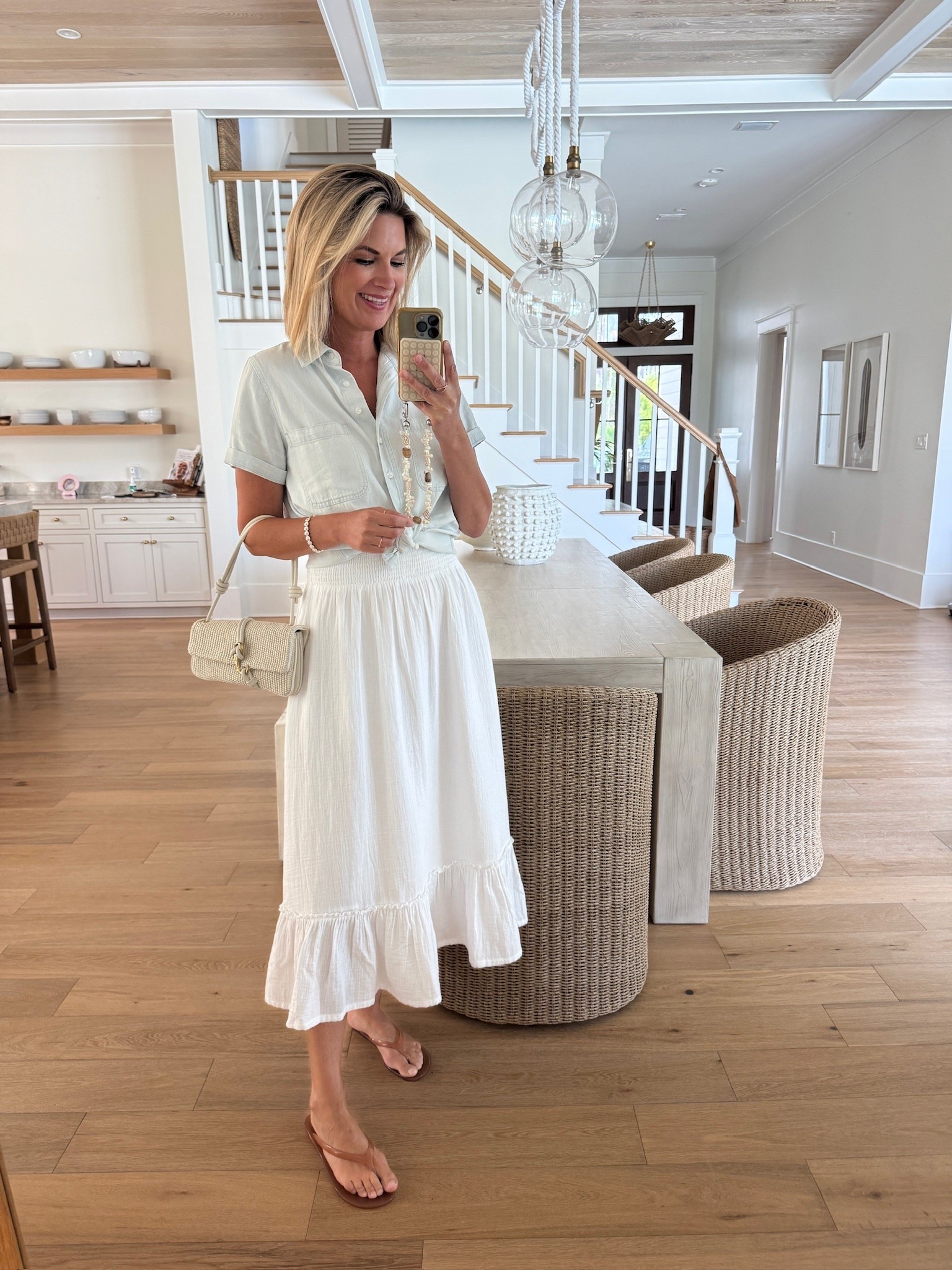 Cell phone strap is sold out in this color but this exact style is available in the turquoise and linking something very similar!  You need the phone case and then all the Ossa strap options are interchangeable.  I have the wood bead crossbody as well.  Small skirt and shirt.

#LTKgrwm #LTKootd #LTKOver40