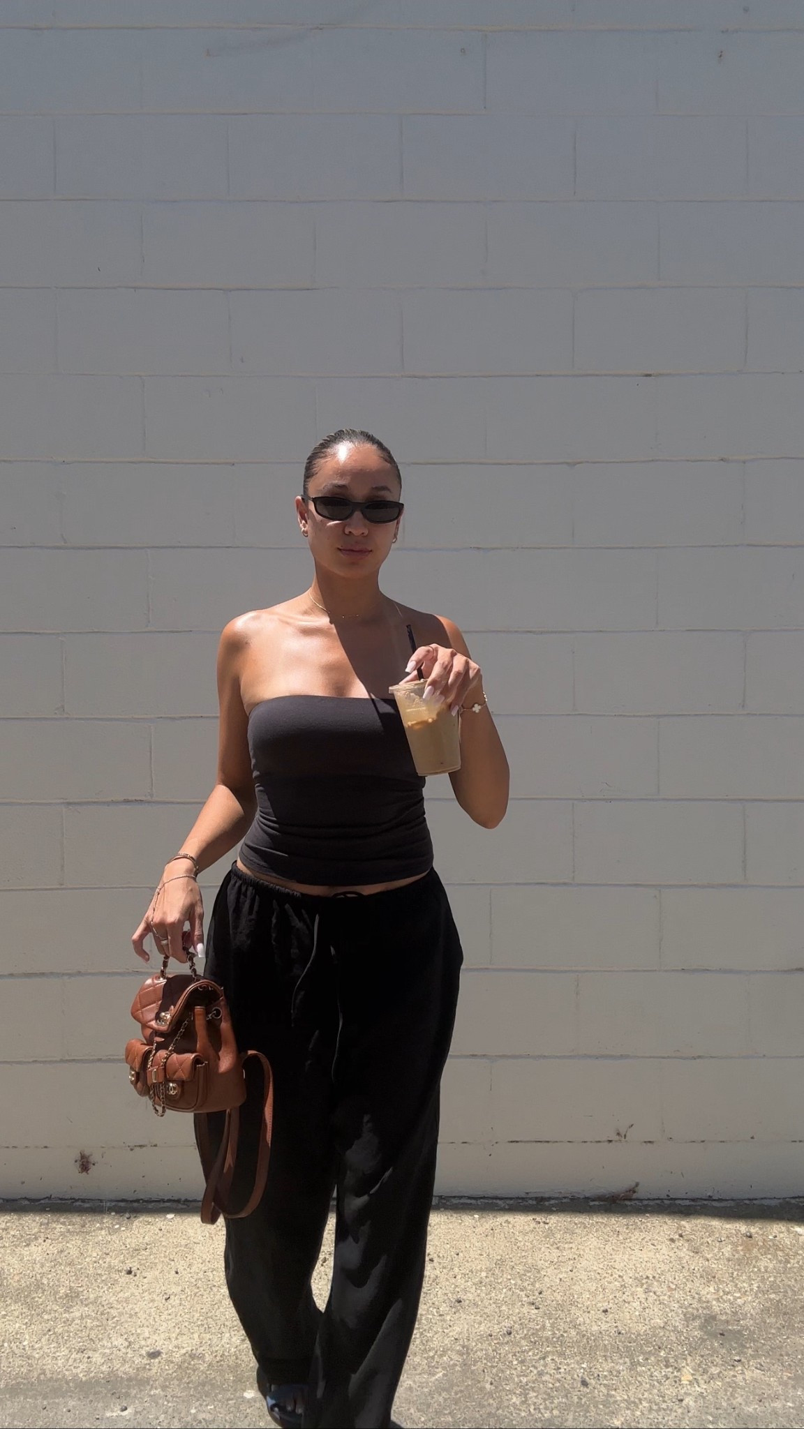 top: skims (size s - if sold out in your size, try the garage clothing one!) bottoms: zara (size large - sized up 2 sizes) sandals: hermes chypre (size up 1 full size) sunglasses: miu miu  (regard - black) backpack: chanel (small) 

#LTKFindsUnder100 #LTKU #LTKStyleTip