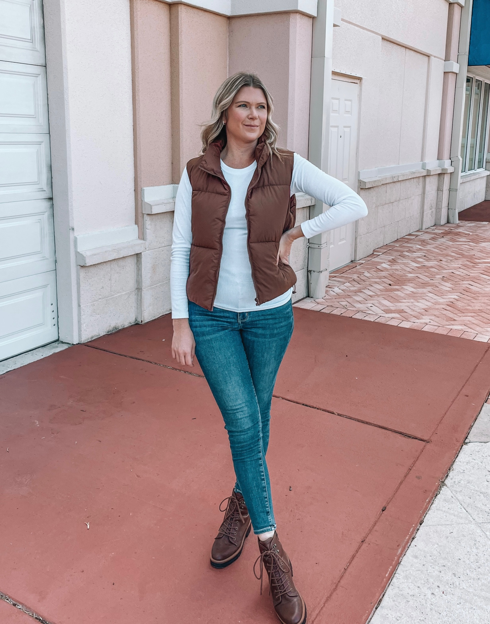 The perfect puffer vest from Amazon! Comes in a ton of color options and under $40. Sized up to a medium for a more oversized fit!



Fall outfits, fall outfit ideas, combat boots, brown boots, ankle boots, puffy vest, puffer jacket, layering tops, ribbed top, long sleeve top, winter outfit, hiking outfit 

#LTKtravel #LTKfindsunder50 #LTKstyletip