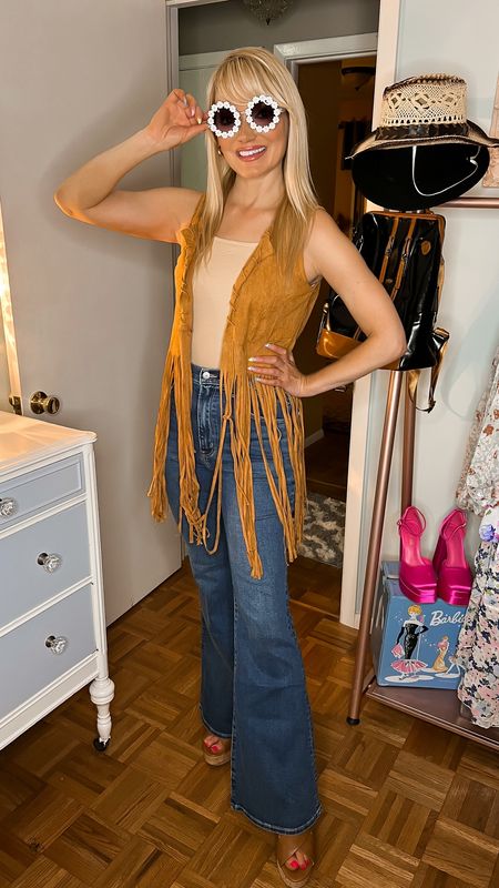 Concert & festival outfits from Amazon Fashion - concert & festival looks - suede fringe vest - round daisy sunglasses from Amazon use code DOLLGER5 to save at checkout - cork platform sandals - Abercrombie & Fitch flare leg jeans - hippie style - retro vibes - Amazon Finds 

#LTKFestival #LTKSeasonal #LTKstyletip