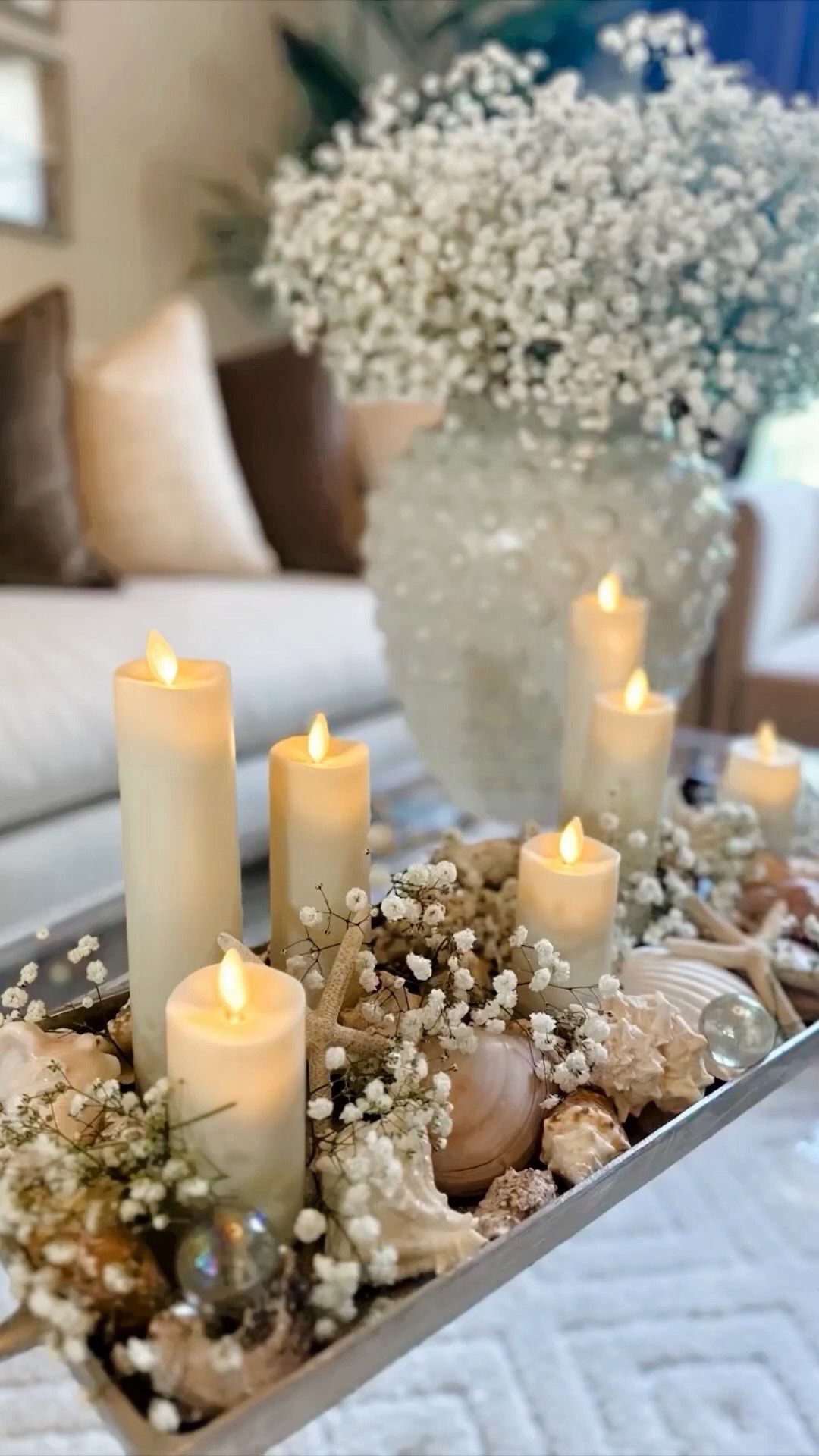 Coastal Candle Garden 🐚✨ Sharing all the pieces I used to create this layered coastal centerpiece — from the flameless candlelight to the natural textures and summer styling details that bring the whole look together.

#LTKSeasonal #LTKHome