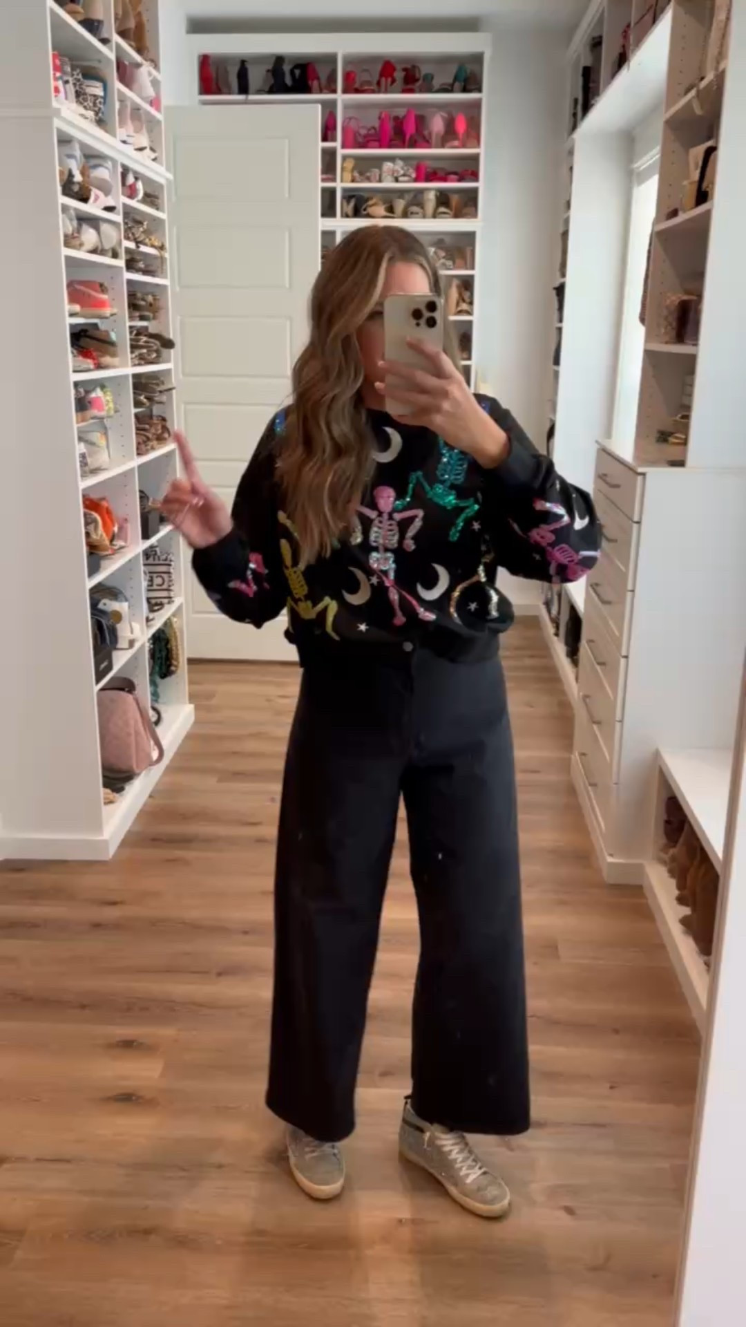 Amazon wins again! Budget-friendly Halloween outfits that are comfortable, mom-friendly, and perfect for a class party. Cute, fun, and stress-free. Exactly what we need this season!  In a large Halloween sweatshirt, size 8 wide leg cropped black jeans, sneakers and accessories- fits tts. shop dandy, halloween, lounge wear, fall outfit, fall lounge, amazon fashion

#LTKSeasonal #LTKFindsUnder50 #LTKStyleTip