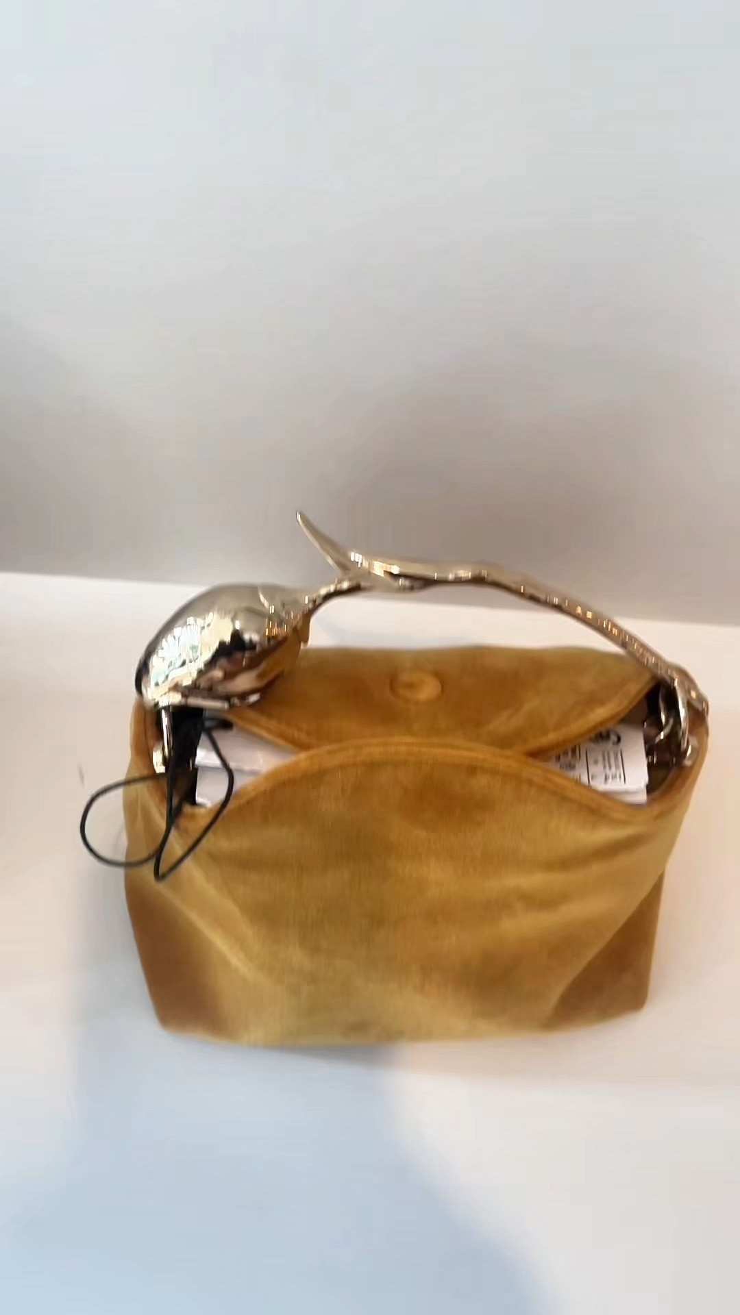 Window shopping in Nantucket. I am in love with these velvet bags, with the sculptural handle, by Erdem, they are the perfect arm candy.

#LTKItBag #LTKParties