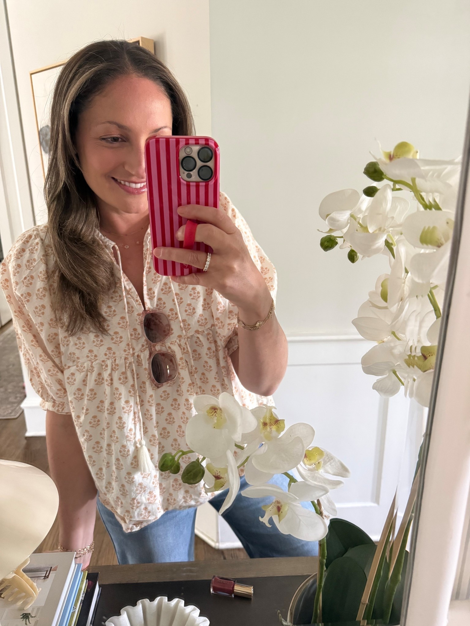 Heading out to dinner! Wearing the prettiest lightweight top from Mara, jeans from Social Threads, sunnies and my favorite easy, looks great on everyone, lip gloss. 

#LTKootd #LTKdayinmylife #LTKSeasonal