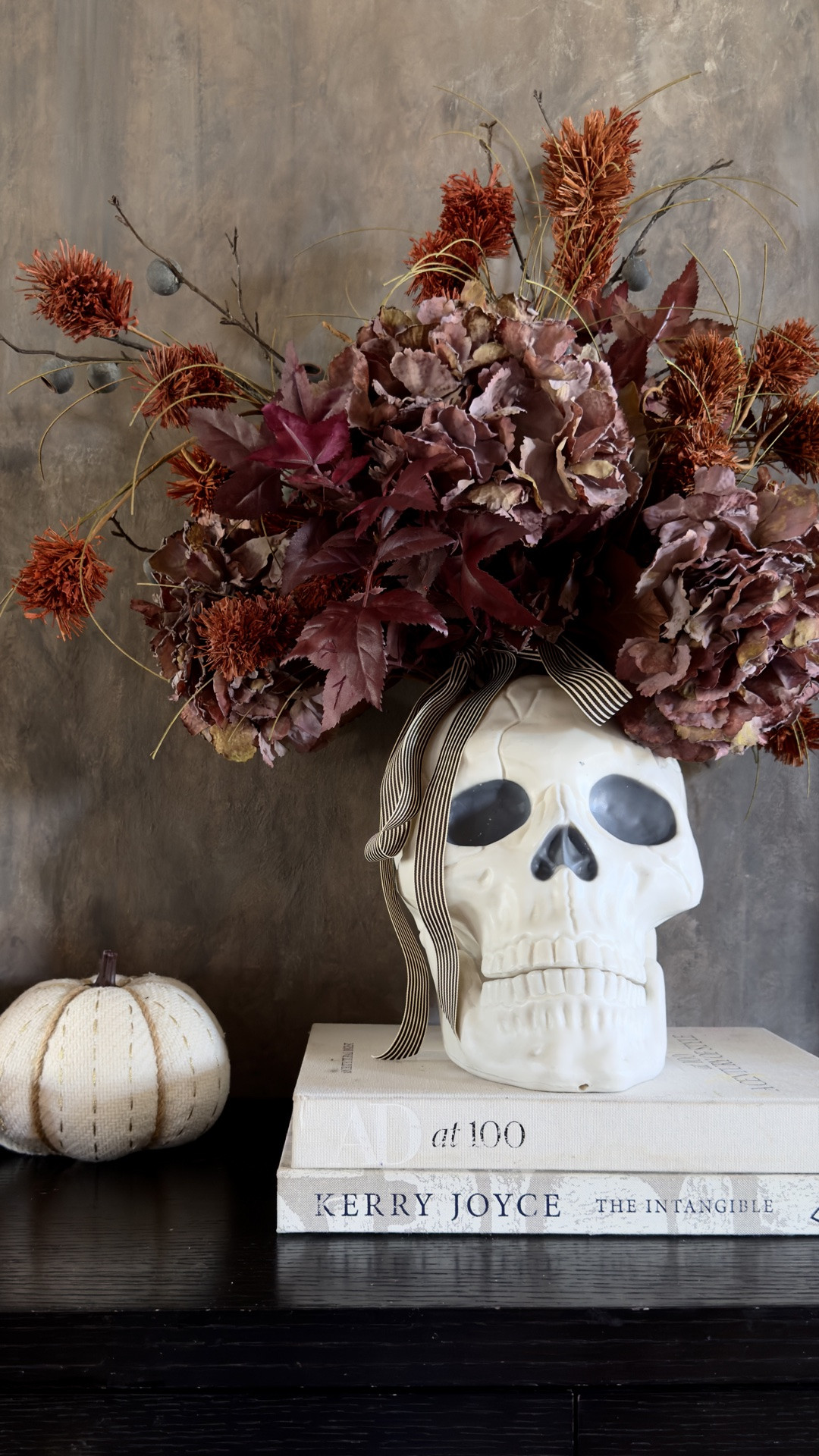 $15 plastic skill + fall flowers = some chic Halloween decor! 😍💀

#LTKSeasonal #LTKHome #LTKSaleAlert