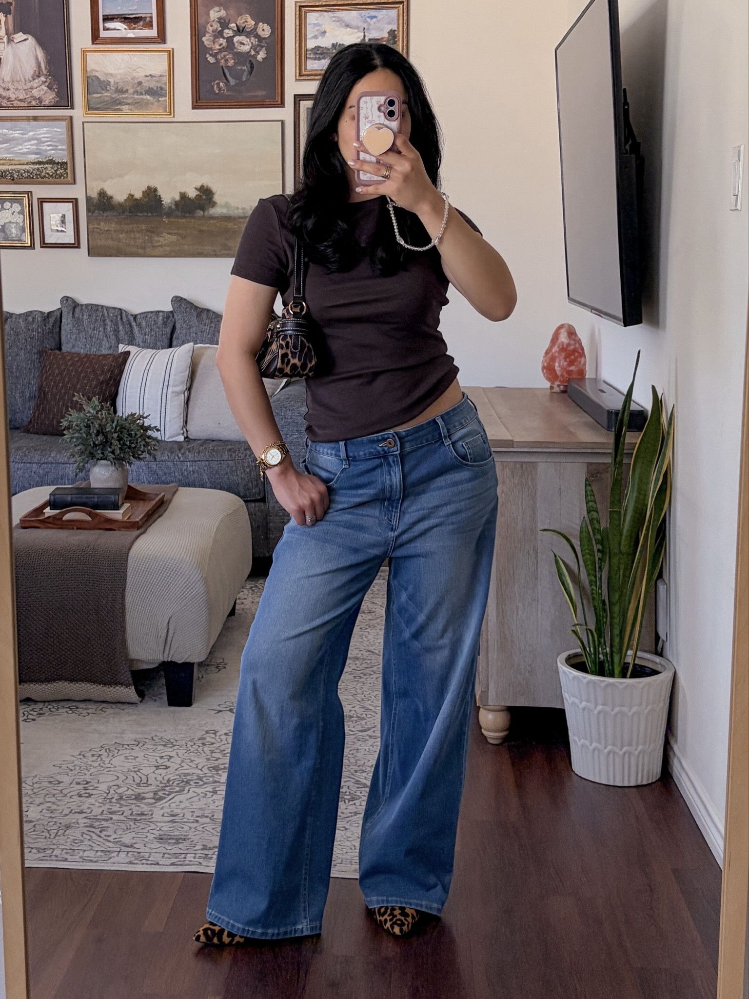 kept it simple 🤎 brown ribbed tshirt outfit, fitted tee outfit, baggy jeans outfit, leopard heels outfit, pointed toe heels outfit, leopard print bag outfit, casual chic outfit, cool girl outfit, effortless chic style, elevated casual outfit, street style chic, modern minimal outfit, neutral outfit inspo, brown outfit aesthetic, denim and heels outfit, jeans and heels look, statement shoes outfit, animal print outfit, leopard print styling, gold jewelry outfit, layered gold jewelry, accessories inspo, model off duty style, everyday chic outfit, casual but elevated, cool girl aesthetic, trendy street style, fashion inspo 2026, ootd, outfit inspo, style inspo, everyday style  

 #LTKFestival #LTKgrwm #LTKootd