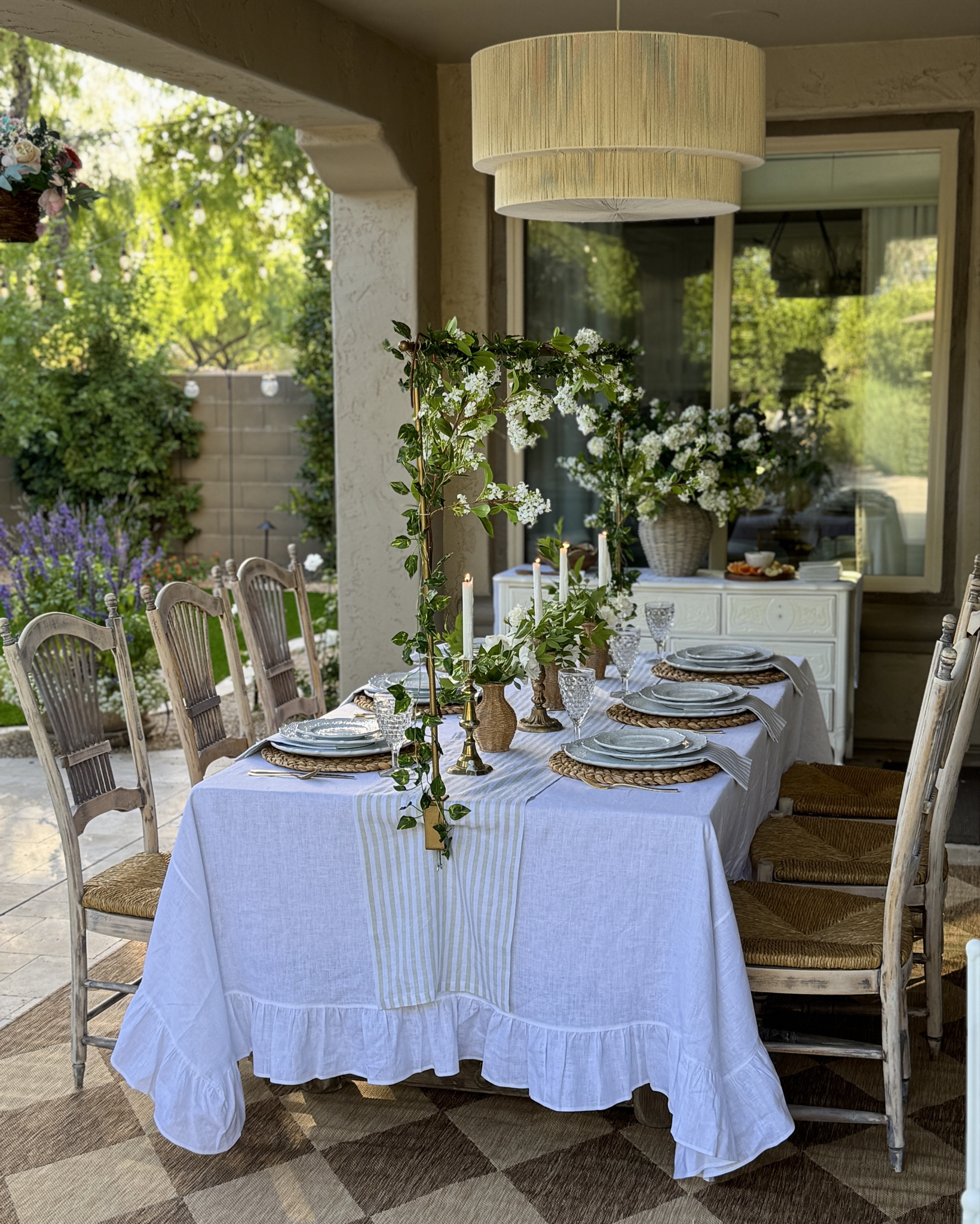 Spring alfresco table with crisp whites, woven textures and soft greens. 

Dishes are Merletto White from Arte Italica Crown Linen, and white ruffled tablecloth is also from there. 

#springtable #Outdoorentertaining #tablescape #alfresco #outdoordining

#LTKFindsUnder100 #LTKFindsUnder50 #LTKHome