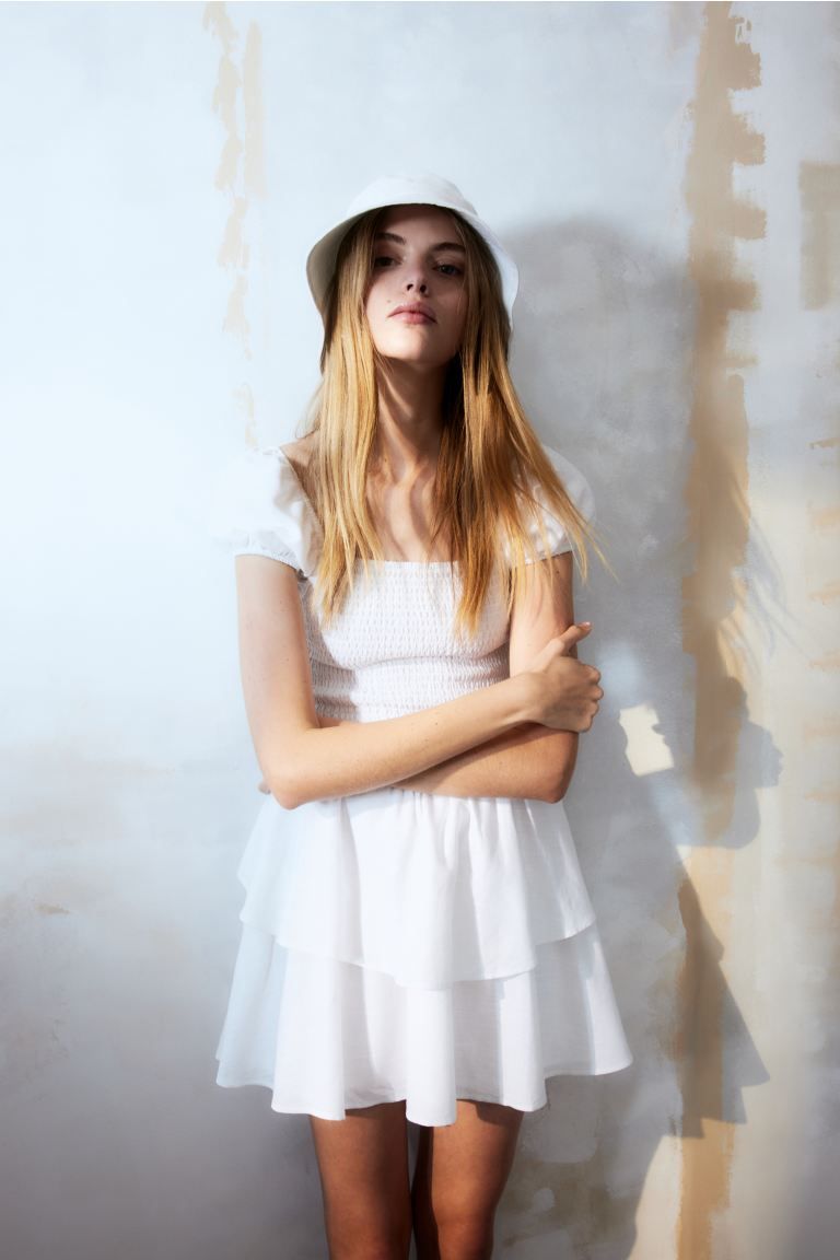 Tiered-skirt smocked dress - White - Ladies | H&M GB | H&M (UK, MY, IN, SG, PH, TW, HK)