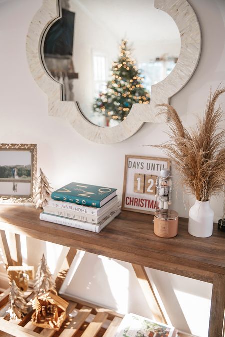 Neutral simple classy holiday decor. Coffee table book styling. Console table styling. Neutral home decor  

#LTKHoliday #LTKSeasonal #LTKhome