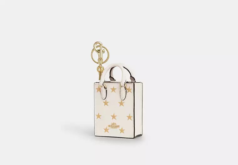 North/South Mini Tote Bag Charm With Star Print | Coach Outlet CA