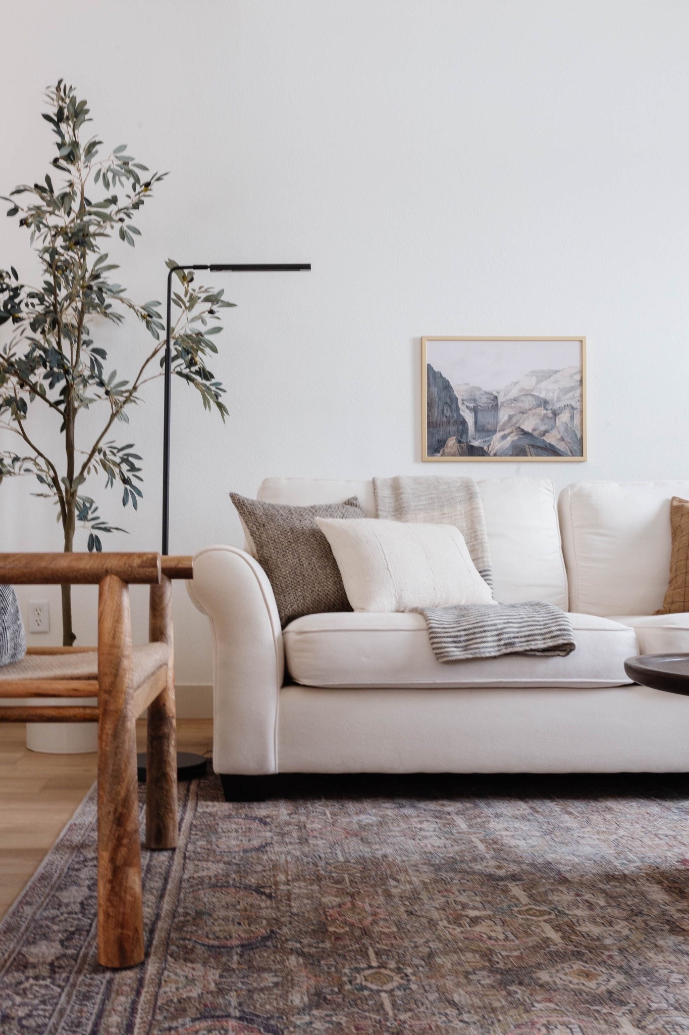 This front living room from #ProjectMeadowbrook had one big request: it needed to be both beautiful and incredibly functional. Our client wanted a space to relax and gather with guests—but also a quiet spot where the kids could do homework or an adult could take a Zoom call in peace. No small task, right?

To make it work, we carved out a workspace by the front window with a slim desk and comfy chair that blend seamlessly into the rest of the room. We layered in high-performance fabrics, a soft rug for playtime, and plenty of seating for hosting friends and family. Every detail was chosen to look elevated, but liveable.

If you're struggling with a space that needs to serve multiple functions, here’s your reminder: you don’t have to sacrifice style for practicality. Think dual-purpose furniture, unexpected layout tweaks, and mixing closed + open storage. A little creativity goes a long way!

Head to the blog to revisit the full reveal and see how we brought this room to life!

#LTKHome