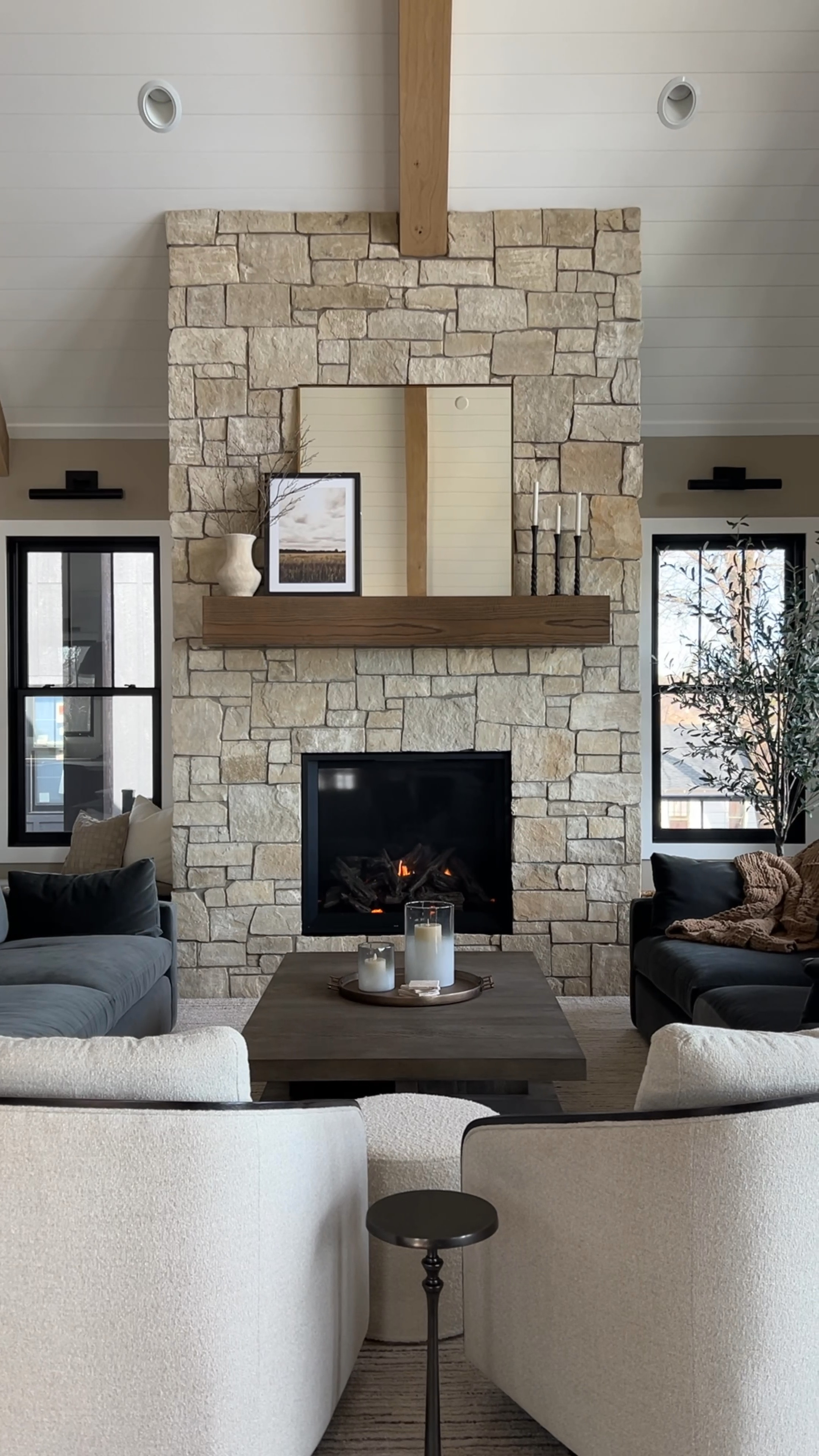 When your vision comes to life 🤍 

Living room decor, great room, mantle decor, fireplace decor, coffee table styling, swivel chairs, sconce lights, oversized mirror 

#LTKstyletip #LTKhome