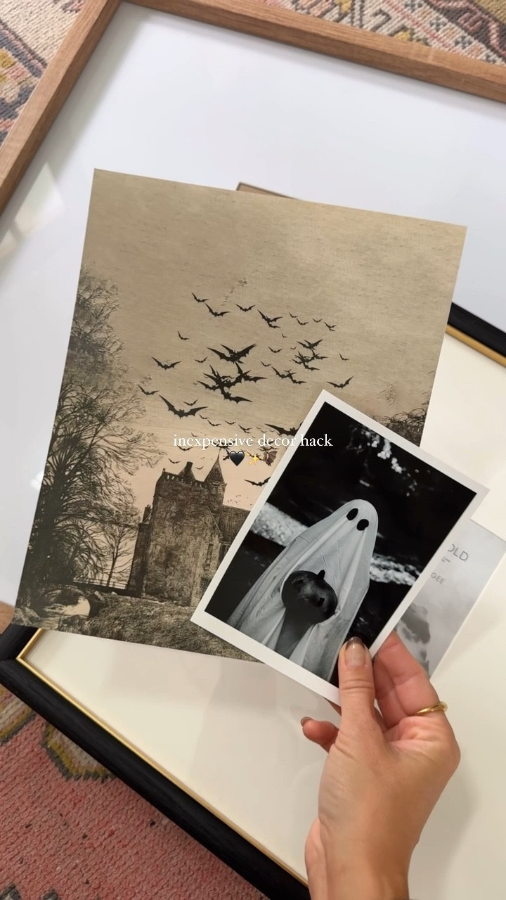 inexpensive decor hack 🦇 | I have done this for years, browse Etsy for fun seasonal themed prints, print same day at Walgreens and frame, switch out for different seasons 🖤 

save + share for budget friendly ideas 🫶🏼
#halloween #halloweendecor #halloweenideas #decorhacks #halloweendiy #diyprojects #etsyfinds #shelfstyling #halloweenhome #seasonaldecor 

#LTKStyleTip #LTKHome #LTKSeasonal