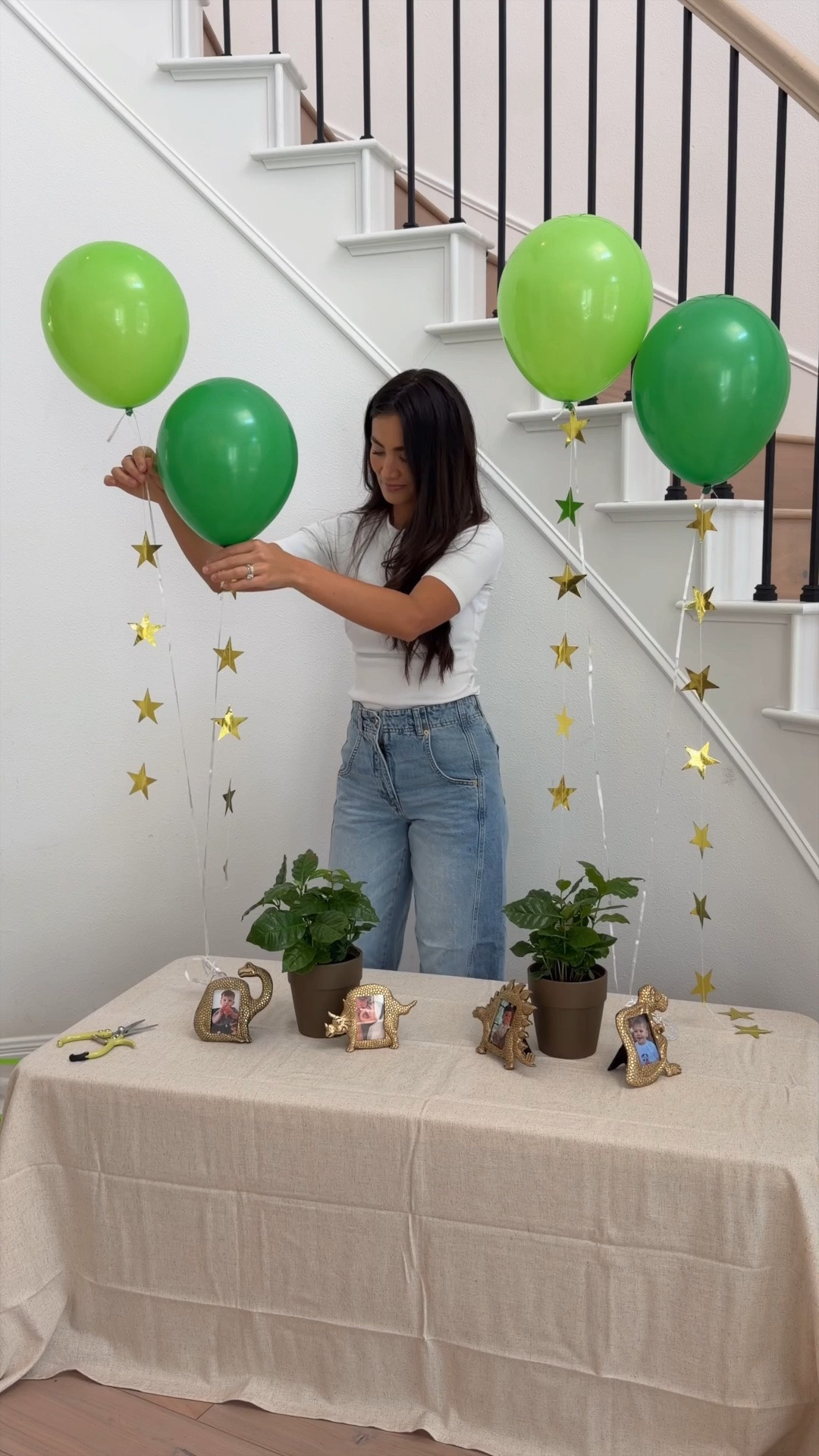 Simple decor for our little dinosaur 🦖 he is turning 2 years old and this kids birthday is definitely still magical! Love this kids birthday idea of painting your own dinosaur. This entire activity is less than $50! Cutest green balloons, star garland, and dinosaur frames for kids party

#LTKKids