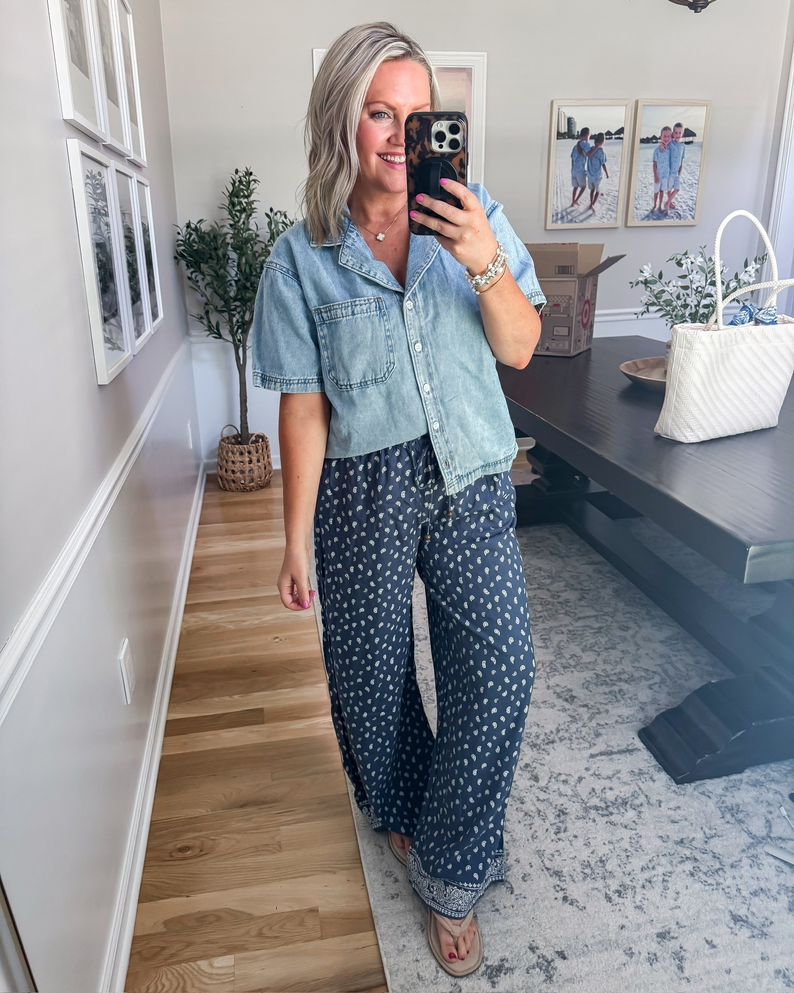 Bestseller! This outfit  is such a good mix of comfortable and cute. The lightweight denim top paired with the printed wide leg pants makes it feel elevated while still being easy enough for everyday wear. Perfect for summer dinners, vacation nights, or whenever you want to look put together without sacrificing comfort.

chambray top, matching set, wide leg pants, vacation outfit, resort wear, summer outfit, lightweight outfit, casual chic style, travel outfit, comfortable fashion, printed pants, everyday style, lovelylifestyling

#LTKootd #LTKSeasonal #LTKOver40