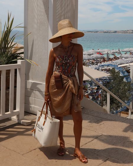 One piece suit that is so chic and elevated can be worn as a bodysuit w jeans for a fun date outfit. My Gucci scarf here being worn as a sarong. Beach outfit 
Euro summer beach outfit 

#LTKShoeCrush #LTKStyleTip #LTKSwim