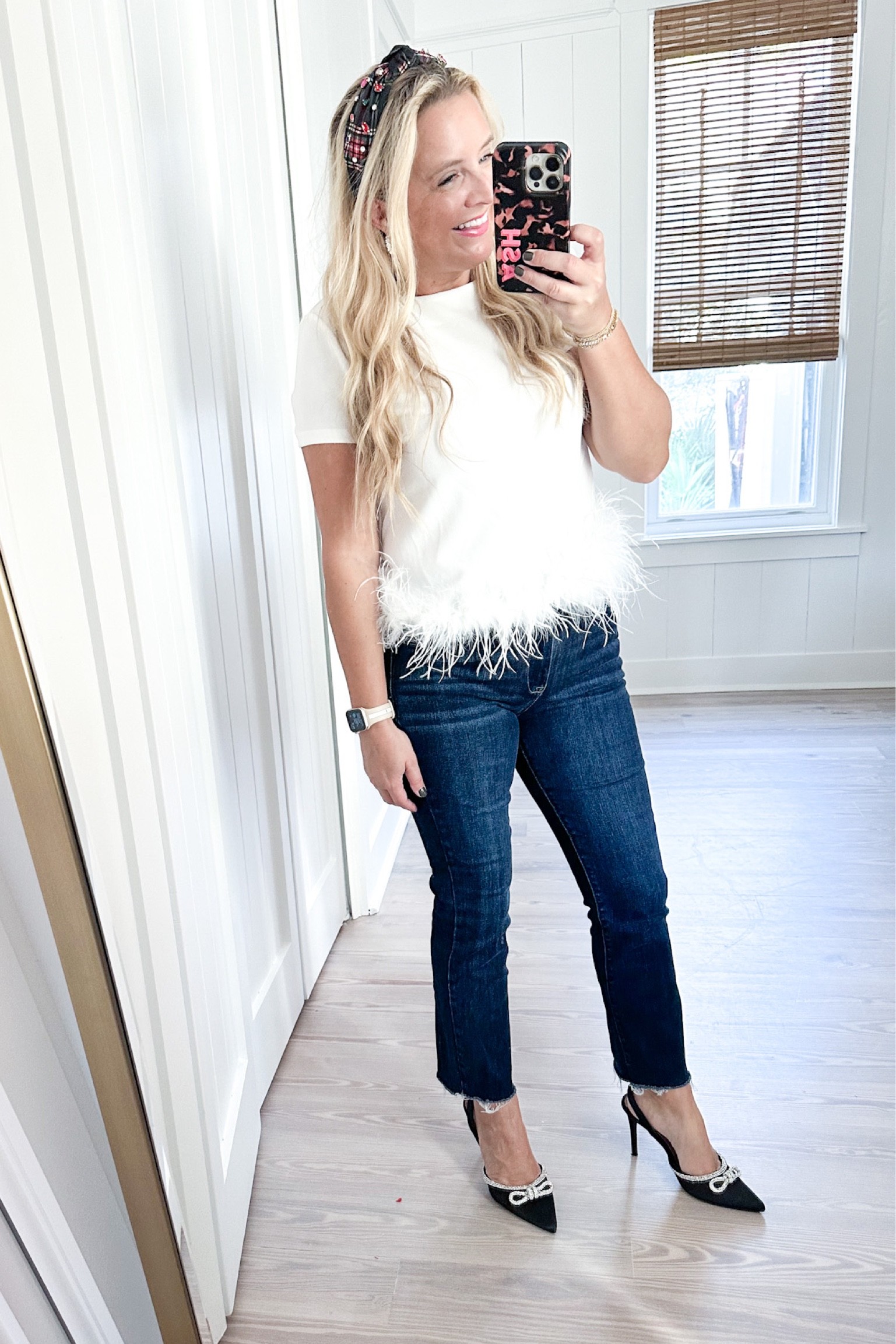 The cutest feather top. Wearing a small, but I’d suggest sizing up in this one!! Code FANCY15 for 15% off the whole look  

#LTKstyletip #LTKHoliday #LTKSeasonal