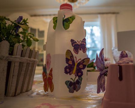 DIY homemade watering can! Take your old milk jugs and poke small holes in the lid!! Fill with water and decorate!! #diy #spring 

#LTKkids #LTKhome #LTKSeasonal