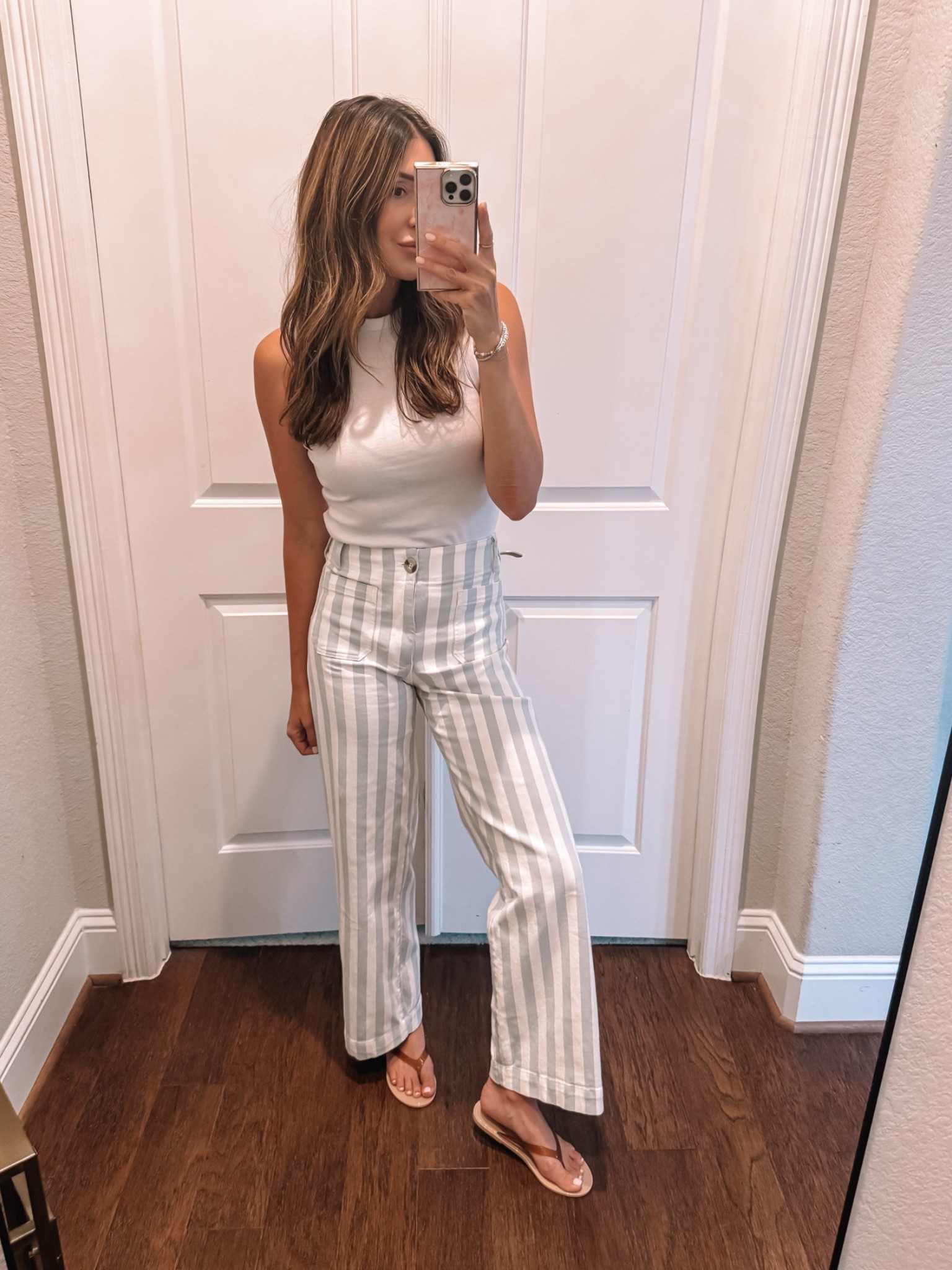 Small in tank, 26 in jeans