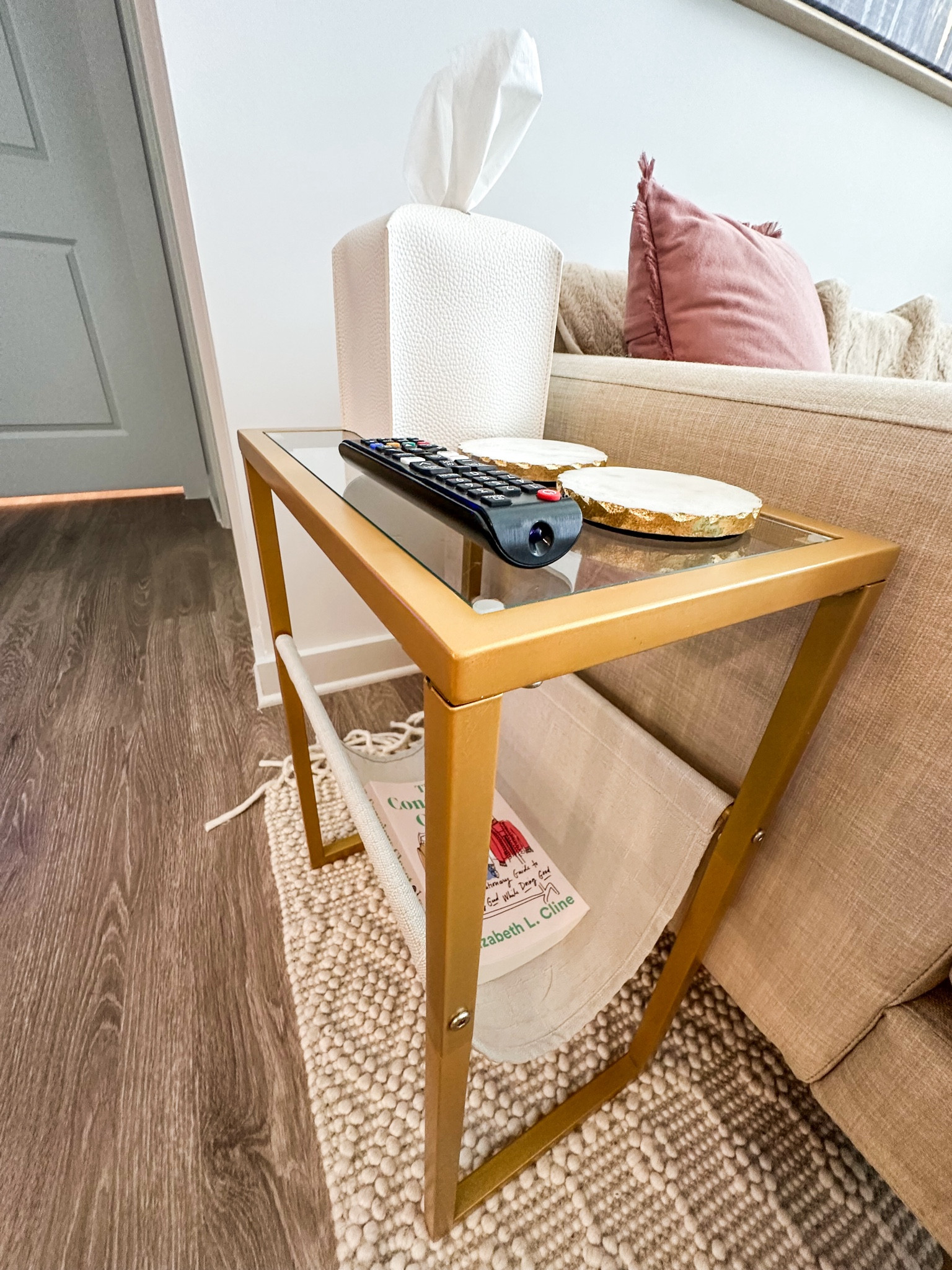 I needed a slim table to fit a couple of coasters, the remote, a tissue box, and had some room for a book or two and this table fit the bill perfectly! Also, can we talk about how the price is UNDER $25?! 

#homeorganization

#LTKHome #LTKFamily #LTKFindsUnder50