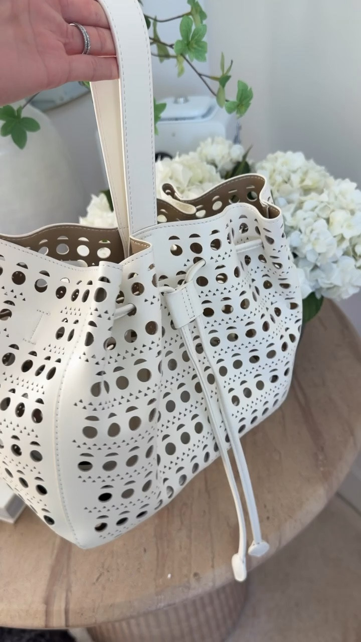 this bag looks way more expensive than it is. the cutout detail is so good and it fits everything without feeling bulky. i’ve been carrying it nonstop with both casual and dressed up outfits. such a good statement neutral for spring and summer

amazon bag, designer look for less, neutral accessories, everyday handbag, spring style, chic on a budget, annabrstyle 

#LTKTravel #LTKSeasonal #LTKOver40