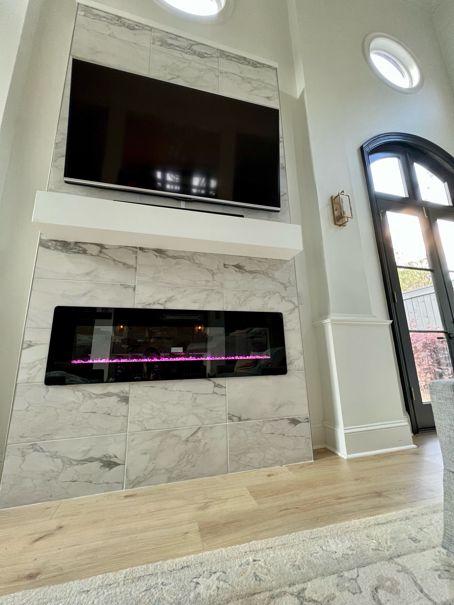 This electric fireplace is an amazon find. It has so many different settings, including colors & flames! #homedecor #fireplace #mantle # electricfireplace #livingroom 

#LTKhome #LTKsalealert #LTKstyletip