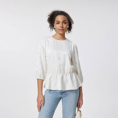 Women's Round Neck Puff Short Sleeve Bow Tie Back Ruffle Bottom Blouse - A New Day™ | Target