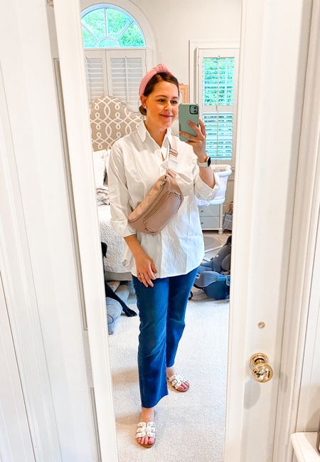 Postpartum mom outfit that’s nursing friendly! Love this diaper belt bag and these stretchy maternity jeans are perfect for postpartum! White button down shirt is easy to nurse in and I love the performance fabric. *Sizing: top runs big, wearing an X-small. 26 in maternity jeans. 

#maternity White button down. Maternity jeans. Diaper belt bag. Postpartum. Maternity style. Mom outfit. Maternity outfit. Breastfeeding. 

#LTKbaby #LTKitbag #LTKbump