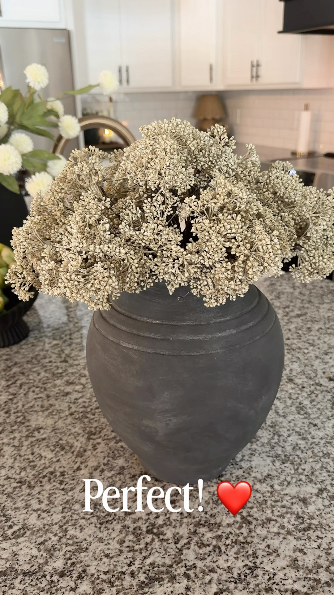 I love a good neutral stem. This one is a beauty. It comes in a bunch. I used 5 bunches to fill this larger vase. What makes this one even better is it can be used year round! This one is a winner! 