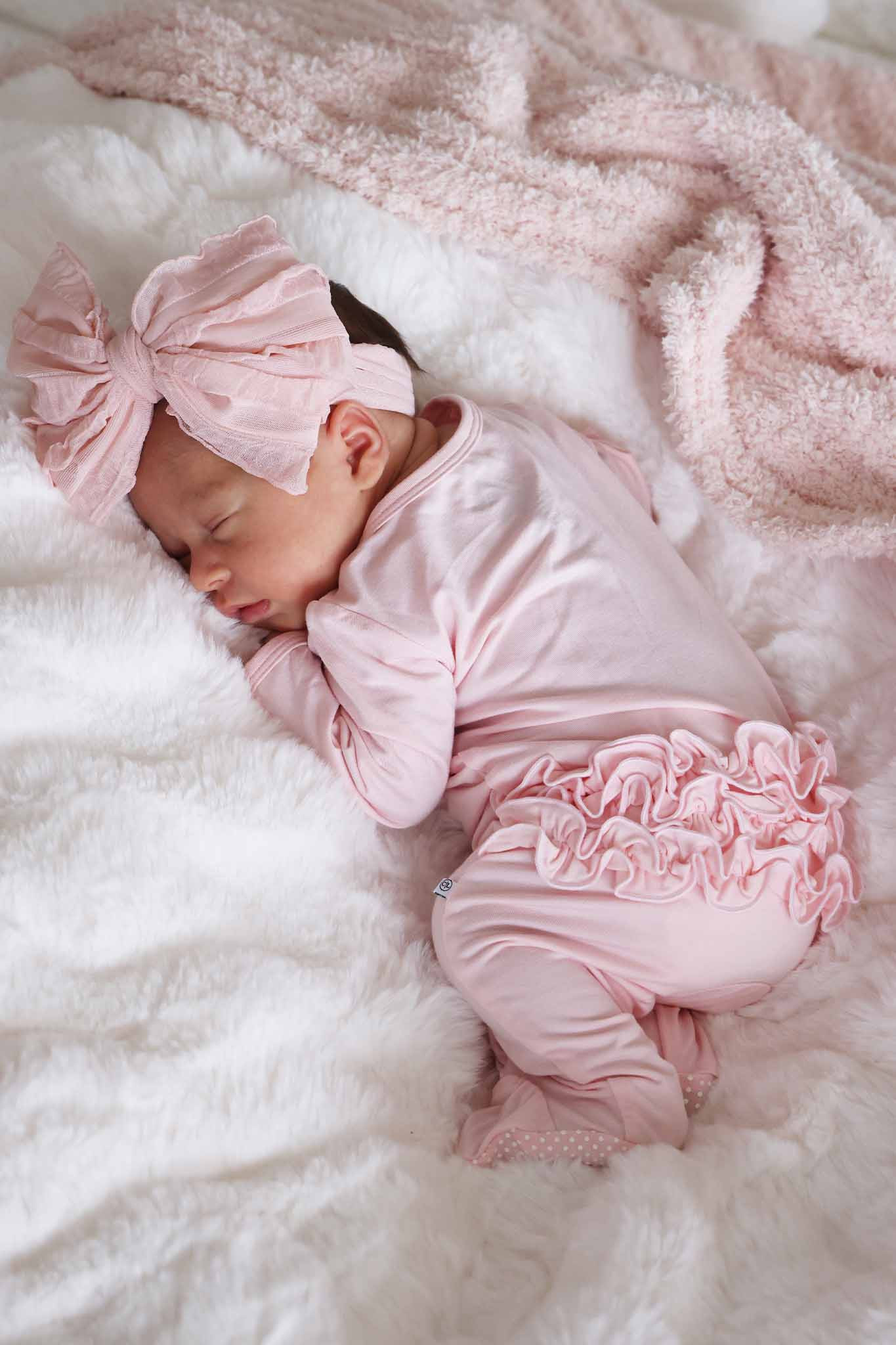 Baby Pink Bamboo Ruffle Zipper Footie | Caden Lane